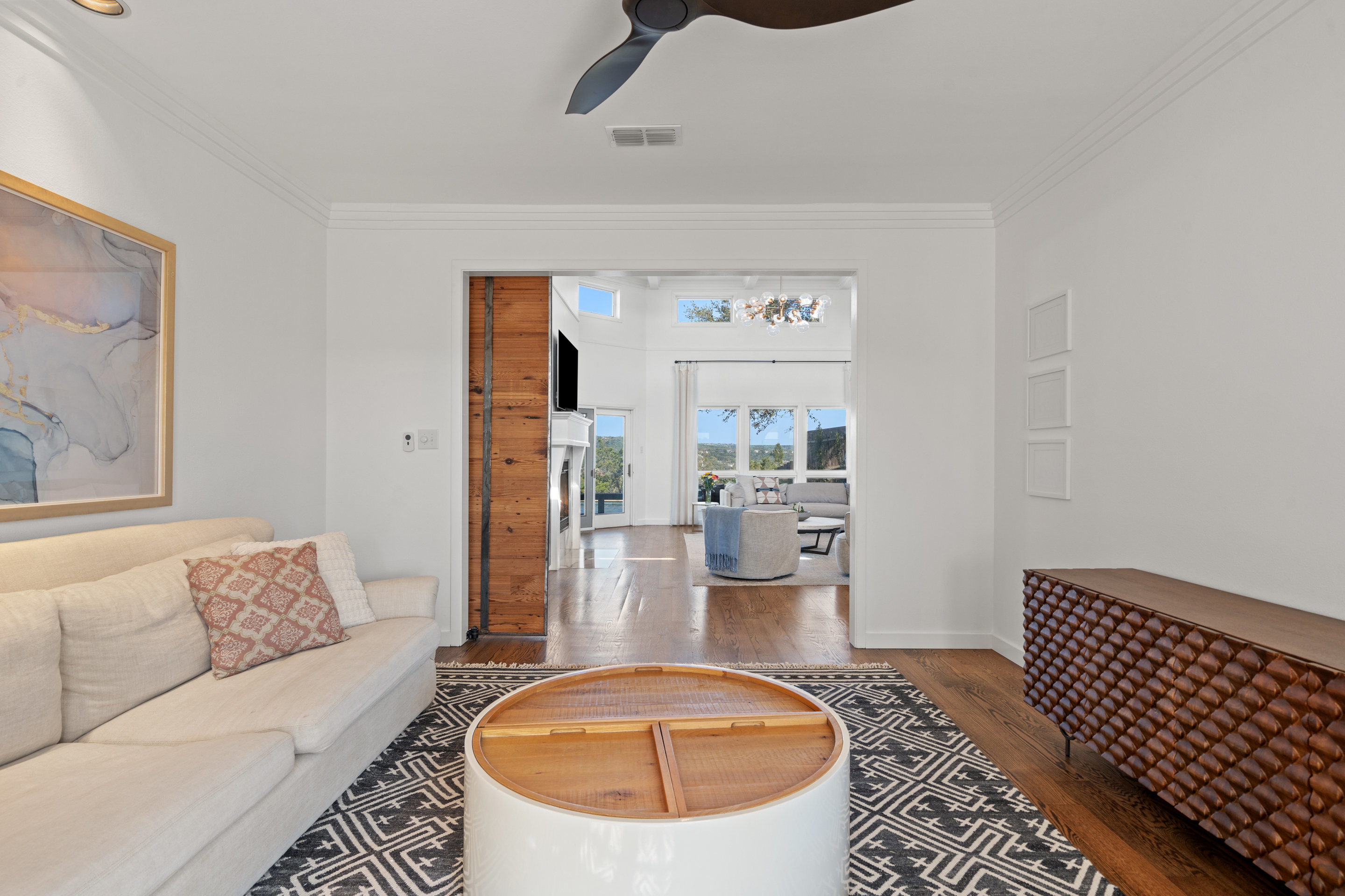 5319 Backtrail Drive Austin, TX 78731 - Photo 21 of 35 a living room with furniture and a table