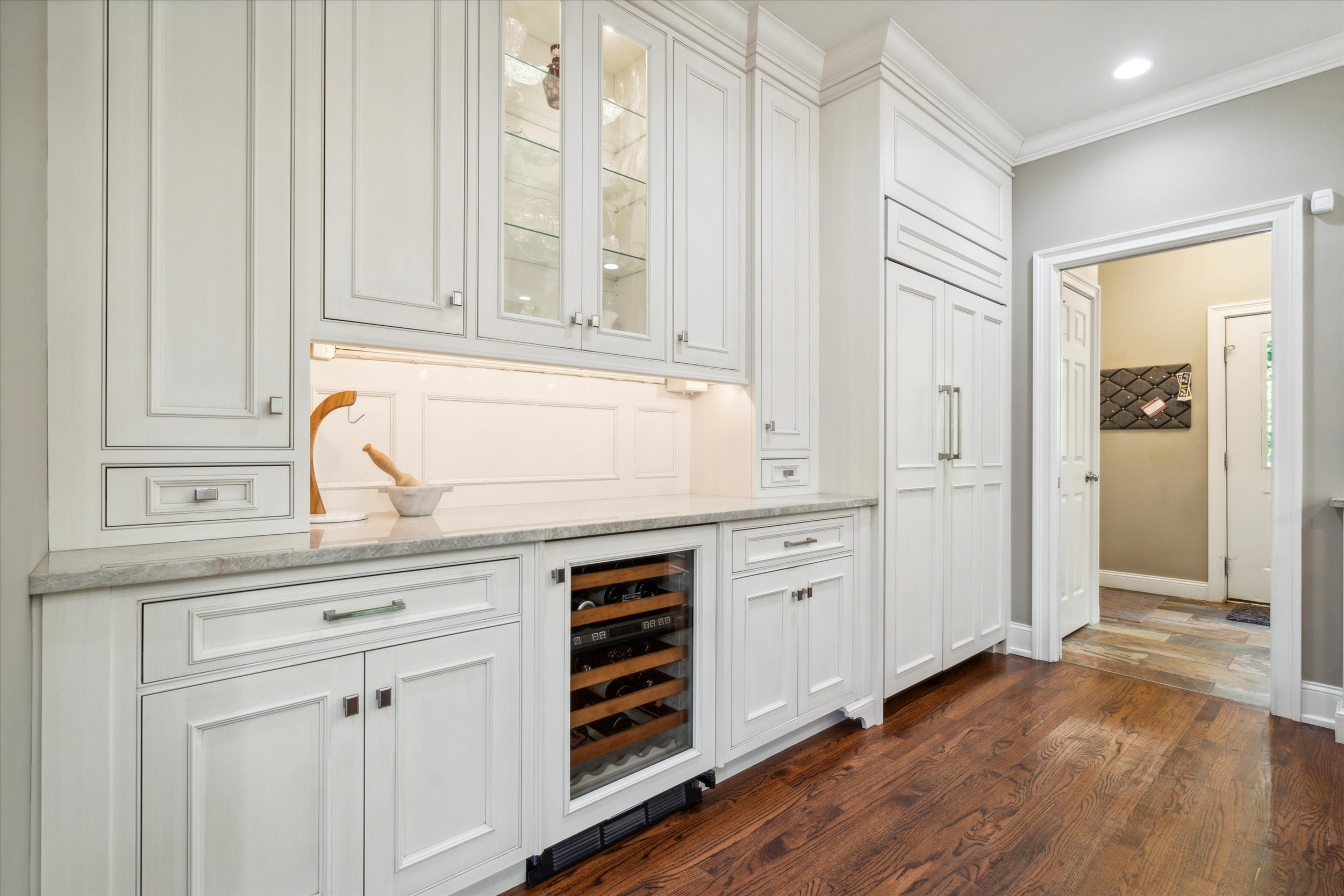 145 Biddulph Road Wayne, PA 19087 - Photo 4 of 39 a view of a kitchen with white cabinets and sink