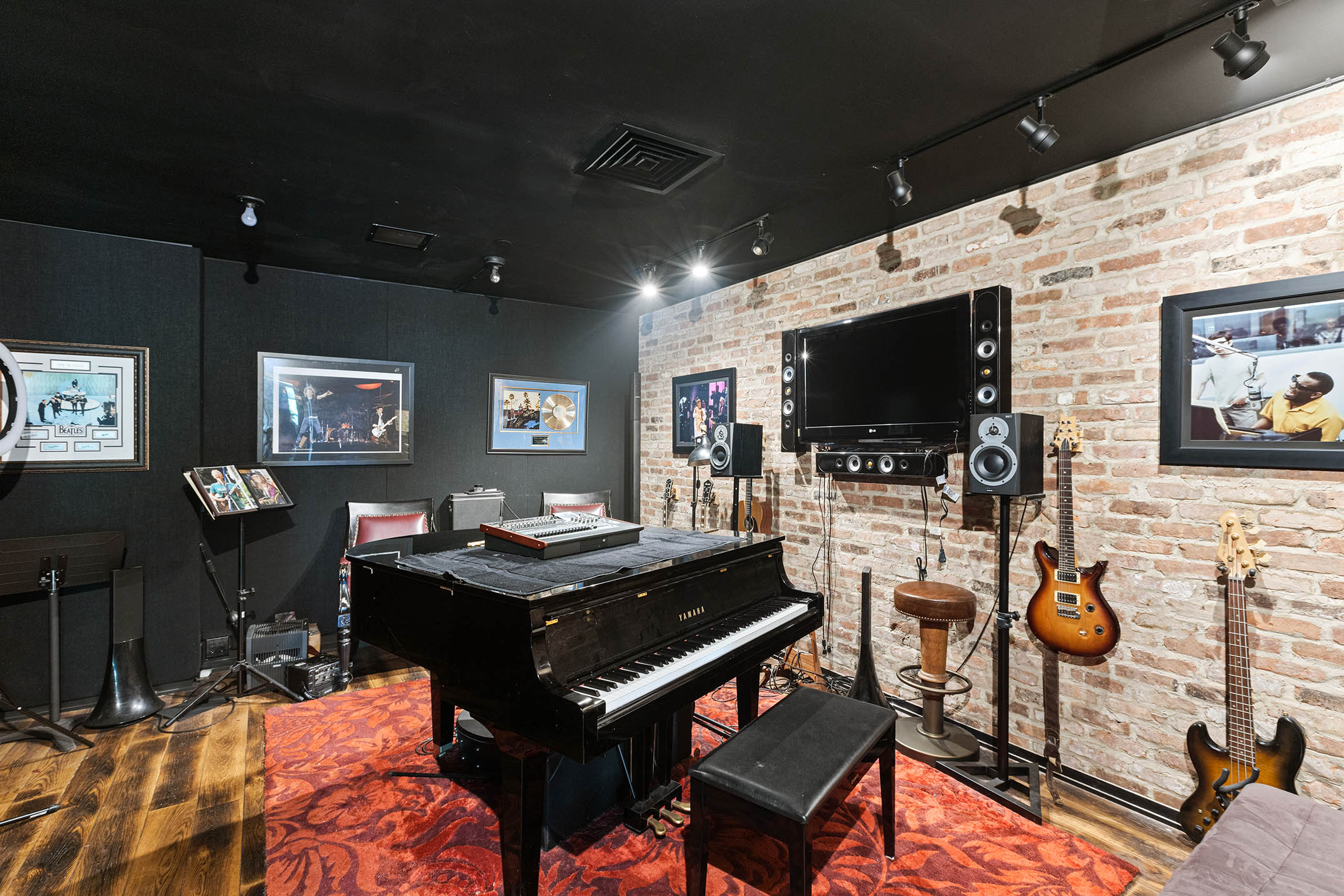 345 West 13th Street, Unit 2DEG Manhattan, NY 10014 - Photo 11 of 14 a living room with furniture and a flat screen tv