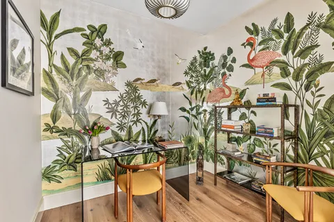 a vase of flowers sitting on a table