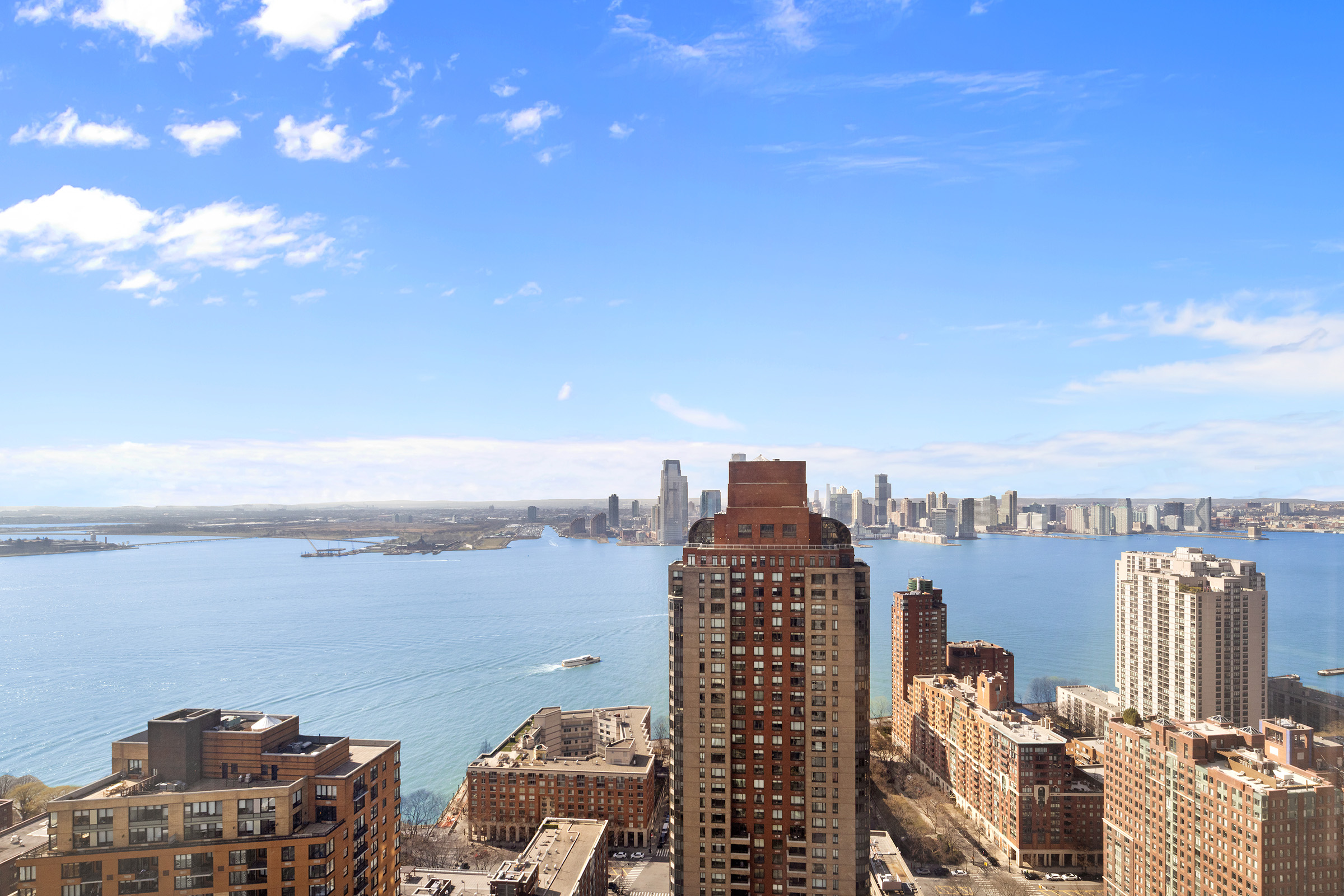 50 West Street, Unit 37C Manhattan, NY 10006 - Photo 13 of 43 a view of city and a ocean