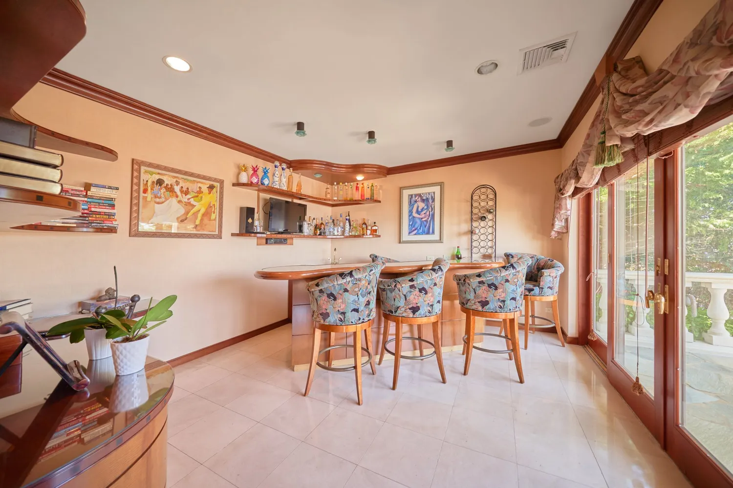 a dining room with furniture a chandelier and window