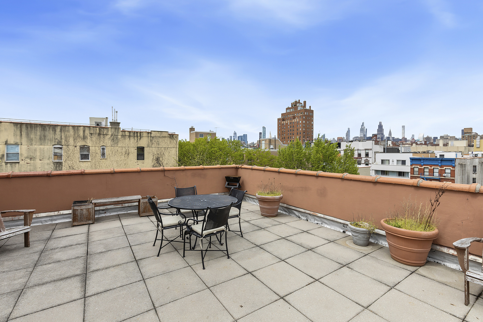217 East 7th Street, Unit 5CD Manhattan, NY 10009 - Photo 10 of 11 a view of a terrace with furniture