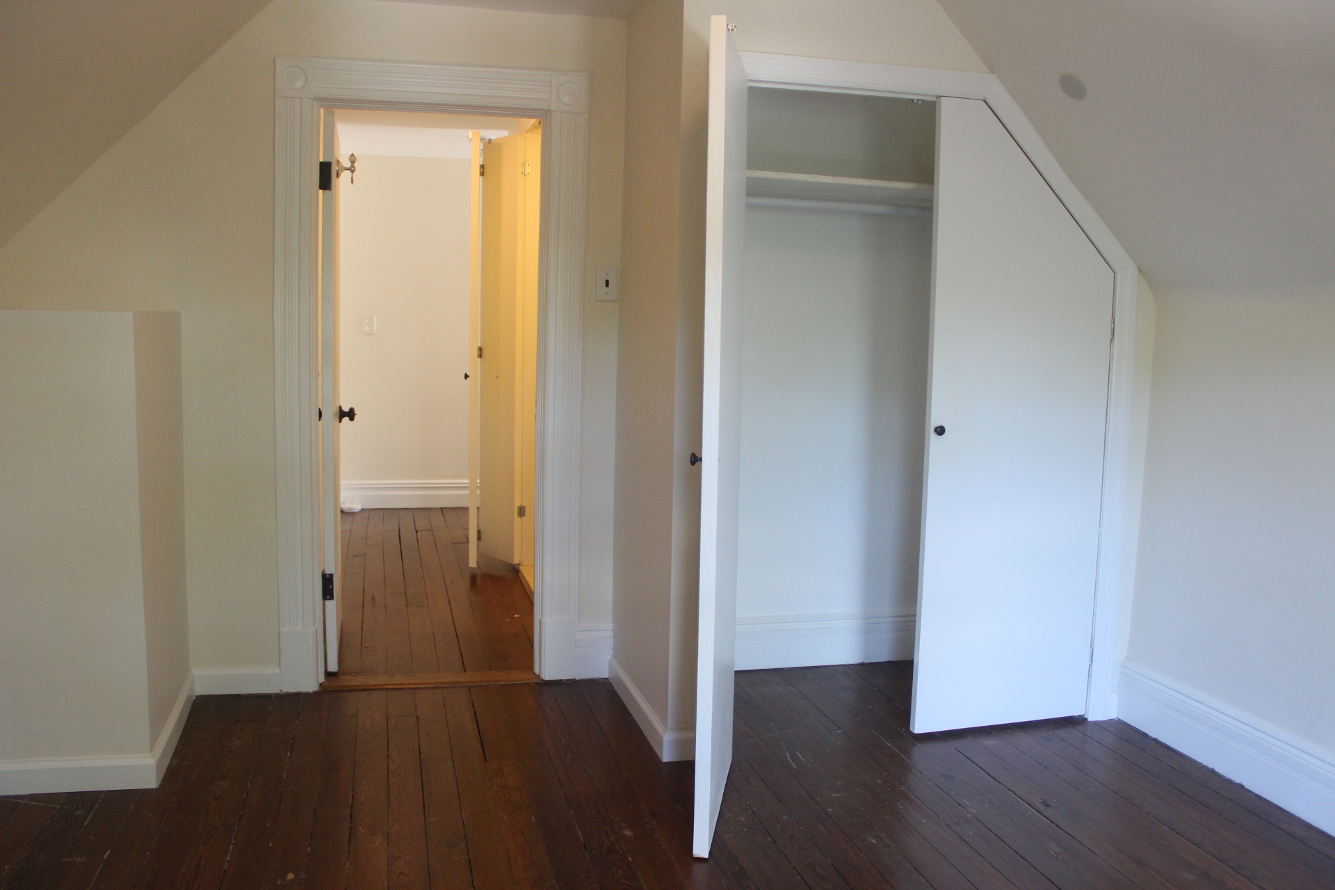 310 East 4th Street, Unit 2 Brooklyn, NY 11218 - Photo 9 of 11 a view of a hallway with wooden floor