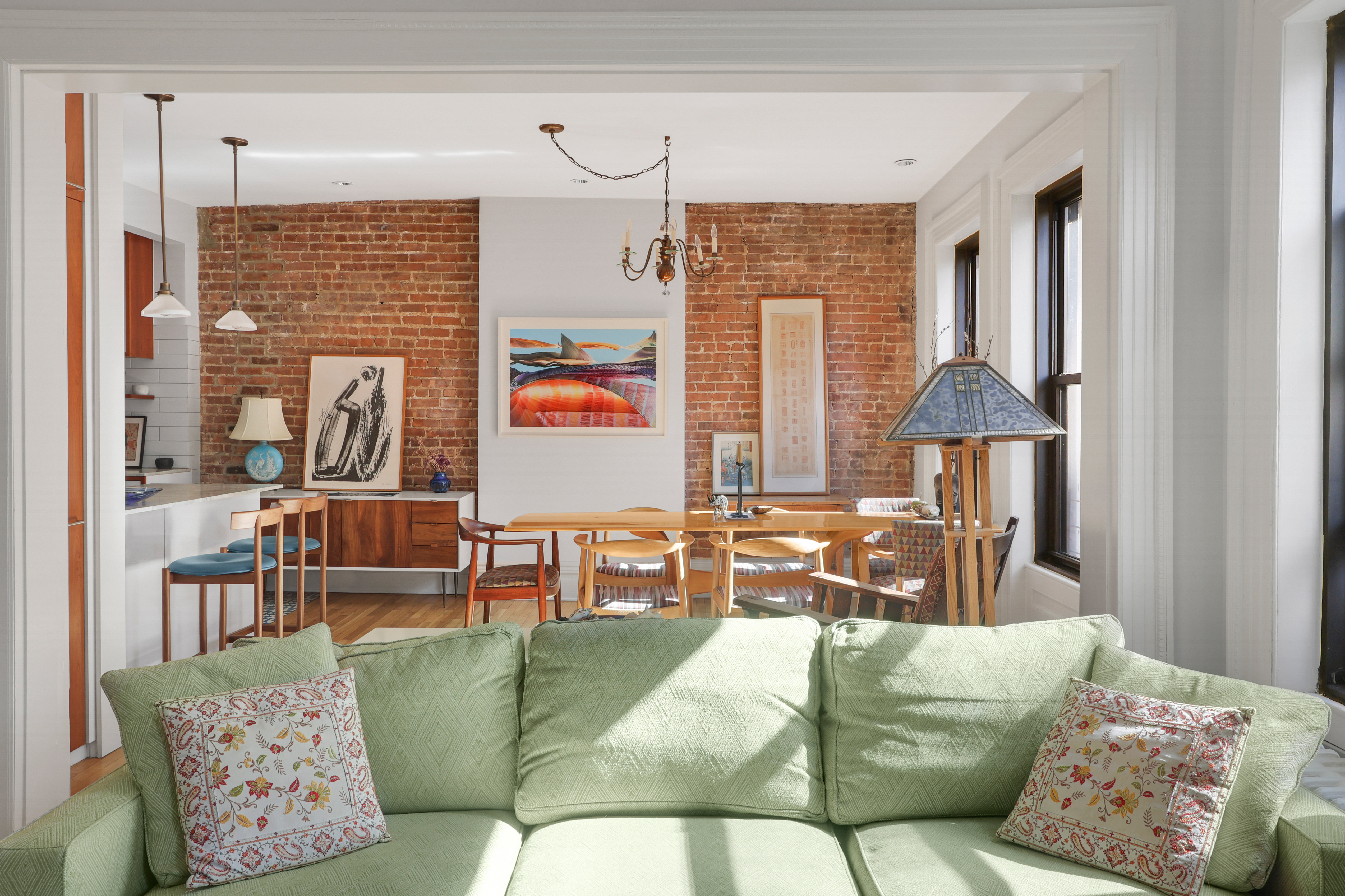 311 West 97th Street, Unit 6E Manhattan, NY 10025 - Photo 2 of 18 a living room with furniture and window