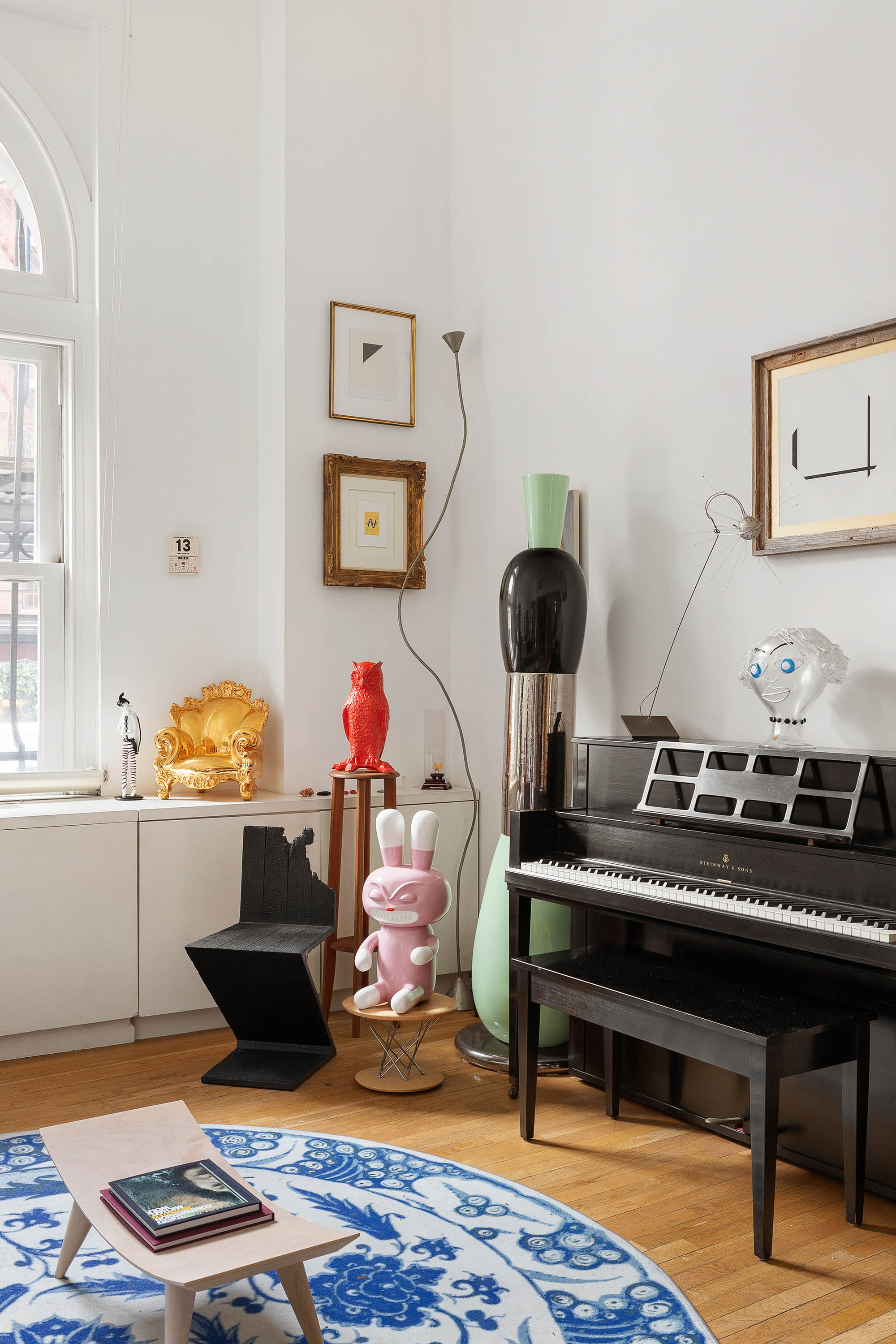 240 Centre Street, Unit 2B Manhattan, NY 10013 - Photo 3 of 12 a living room with furniture and wooden floor
