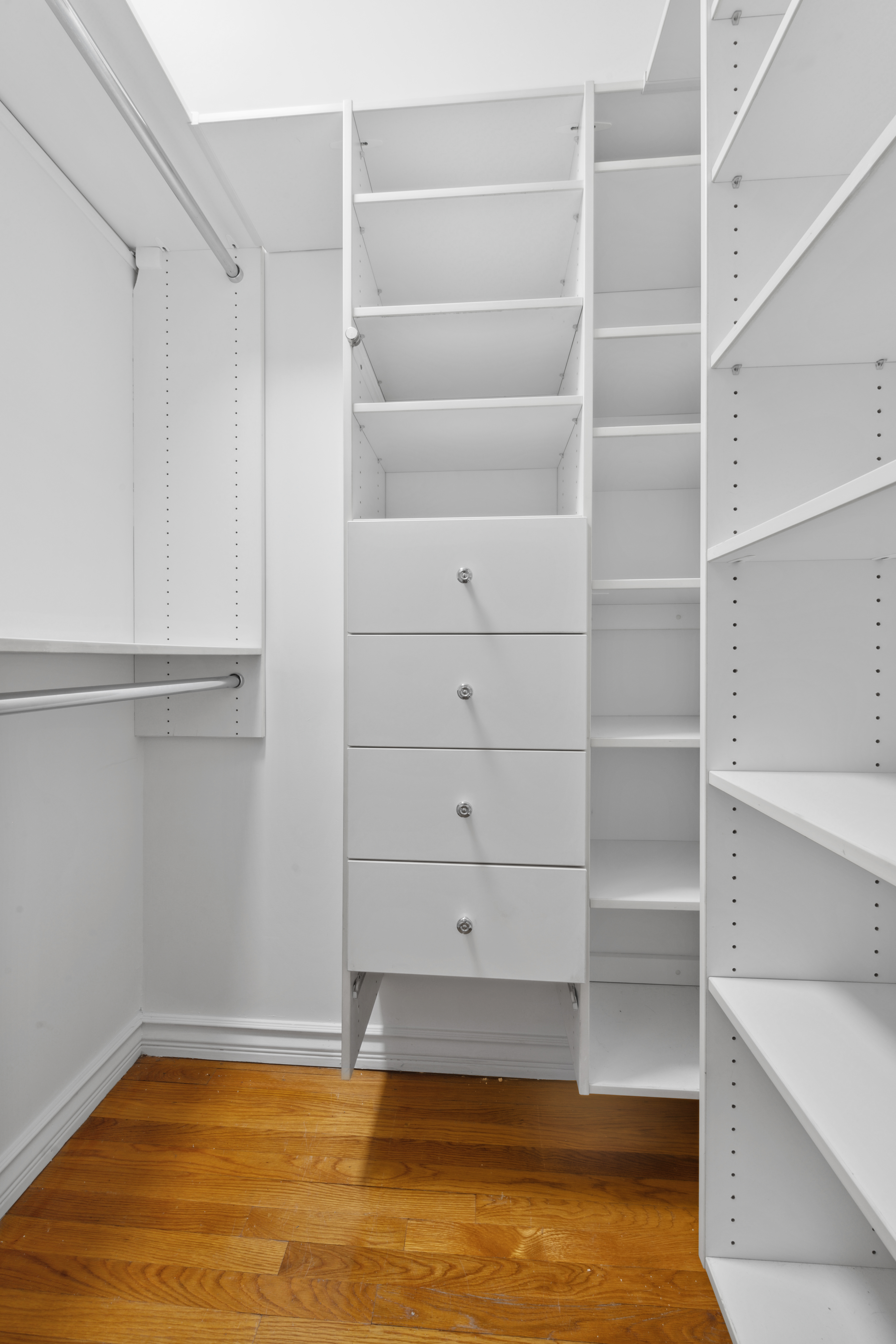 201 West 72nd Street, Unit 3I Manhattan, NY 10023 - Photo 8 of 13 a view of walk in closet with empty racks