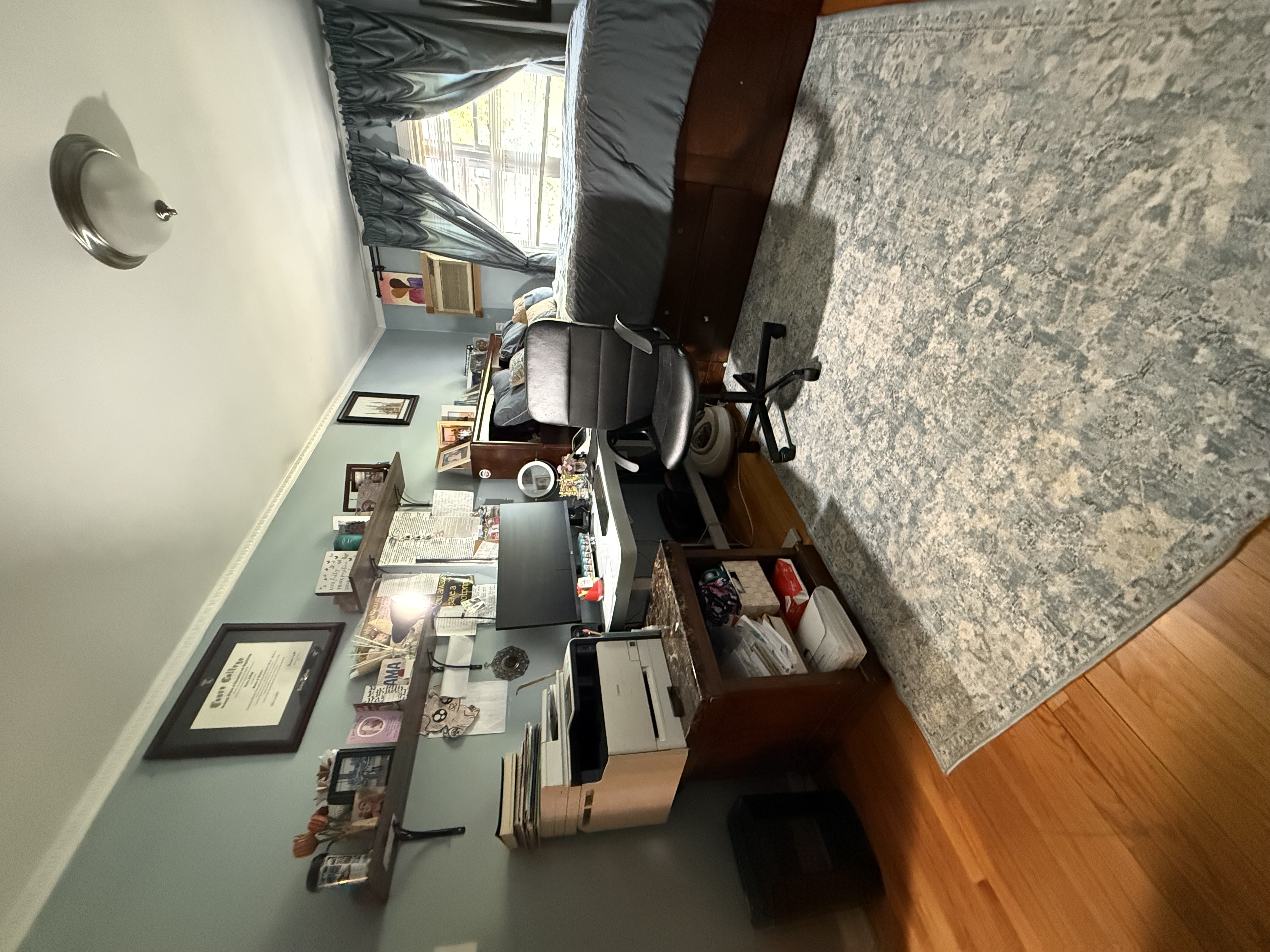 62-23 69th Place Queens, NY 11379 - Photo 2 of 4 a room with furniture