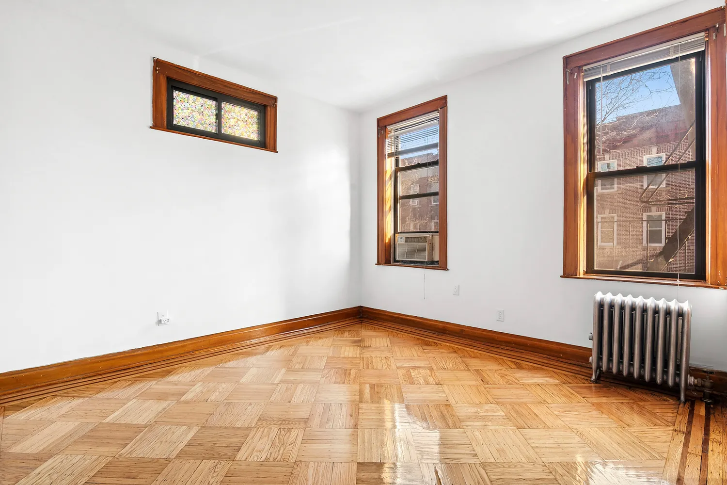 a view of an empty room with a window