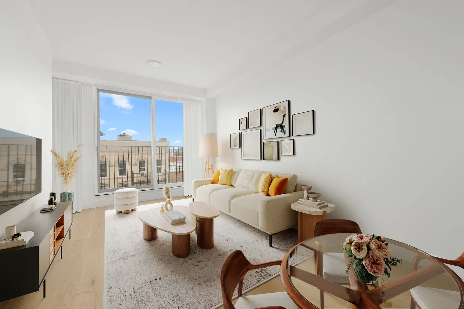 a living room with furniture and a floor to ceiling window