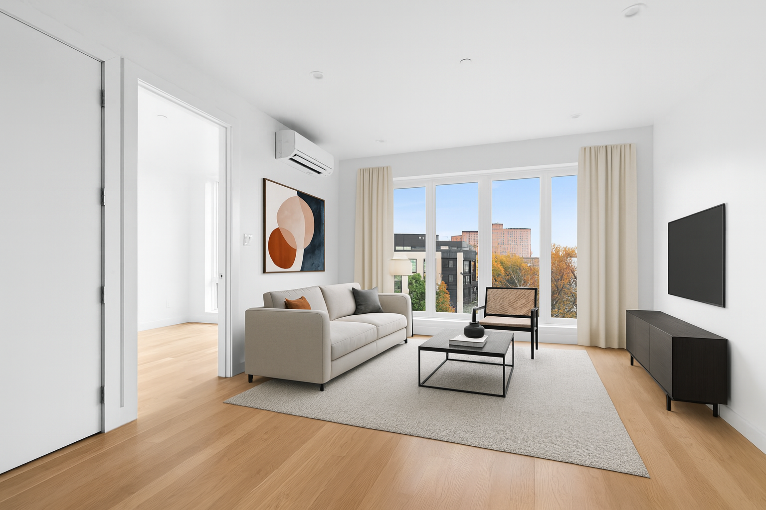 a living room with furniture and a flat screen tv