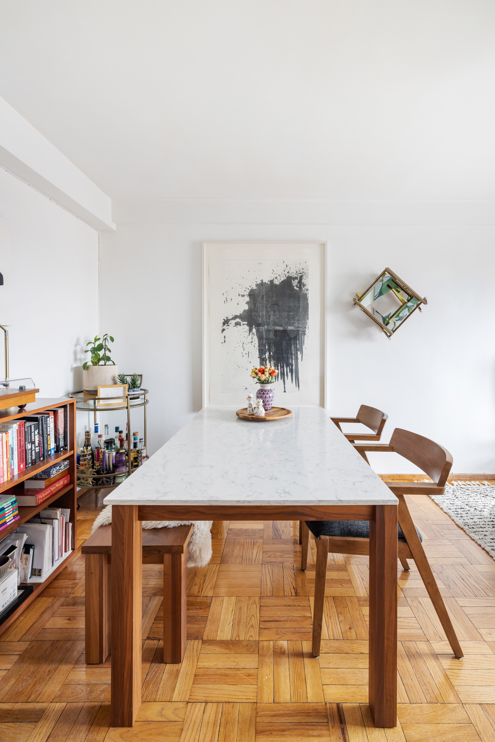 325 Clinton Avenue, Unit 7A Brooklyn, NY 11205 - Photo 3 of 13 a room with furniture and a book shelf