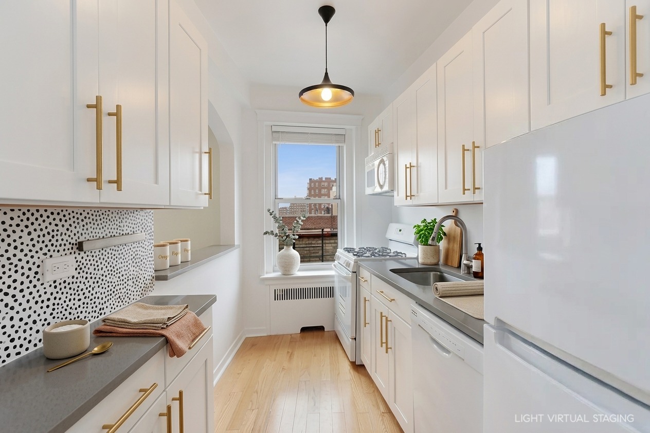 250 Cabrini Boulevard, Unit 9E Manhattan, NY 10033 - Photo 8 of 19 a kitchen with white cabinets and appliances