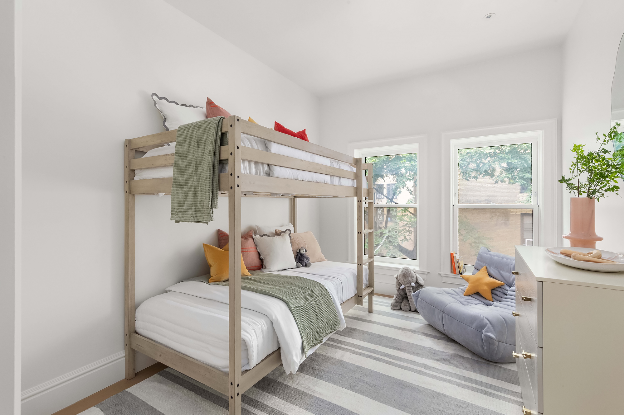 344 West 84th Street, Unit PH Manhattan, NY 10024 - Photo 9 of 11 a bedroom with bed and window