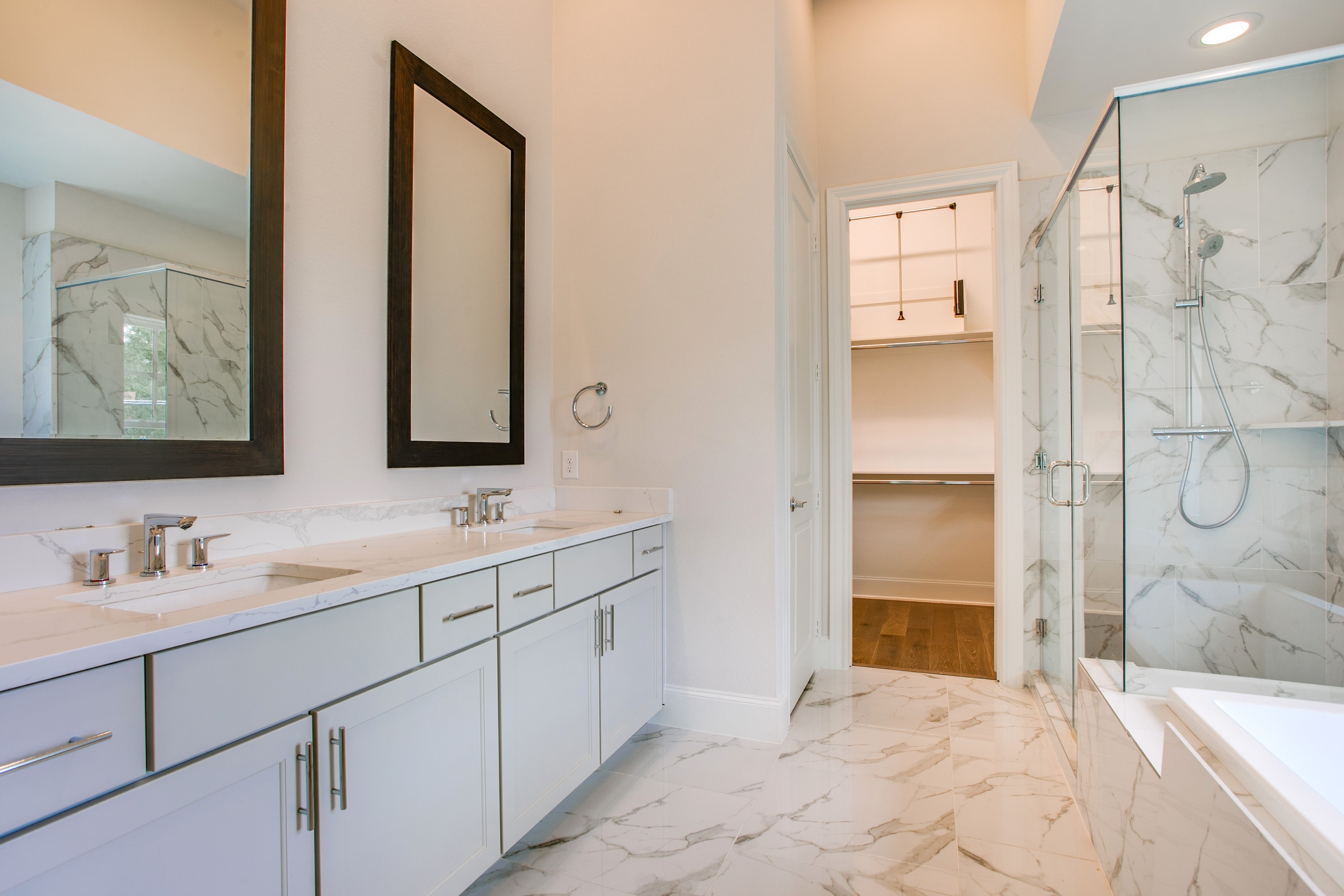 1408 N Avenue Plano, TX 75074 - Photo 12 of 13 a bathroom with a double vanity sink mirror and double