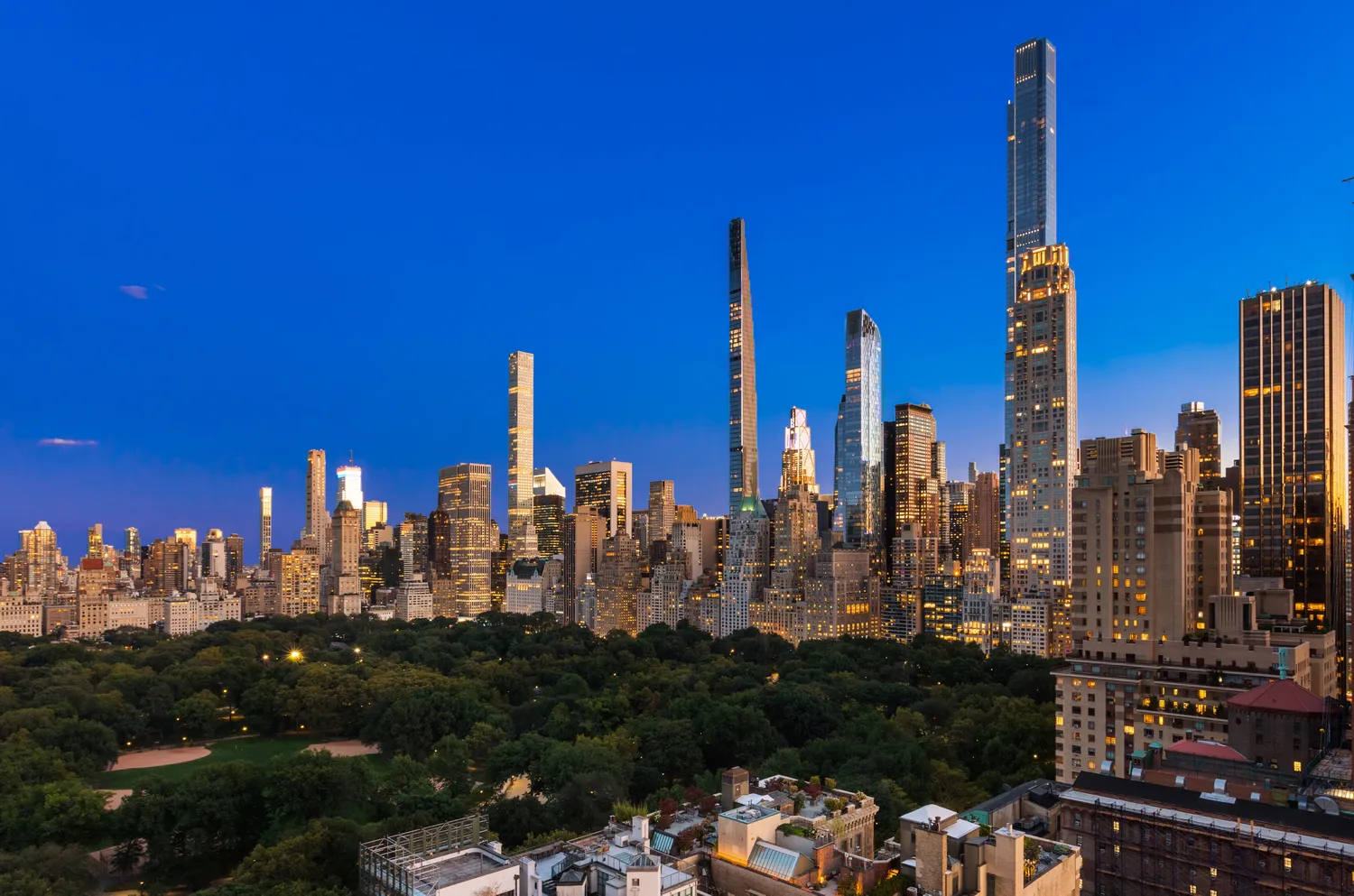 a view of a city with tall buildings