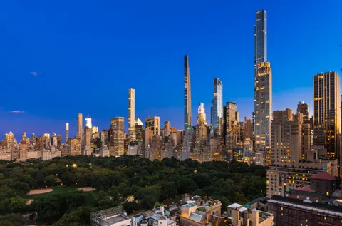 a view of a city with tall buildings