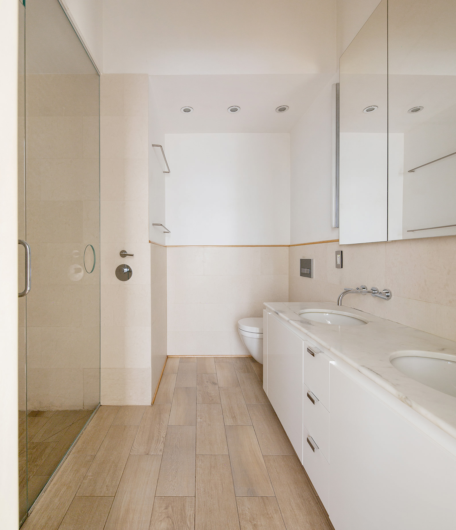 22 East 18th Street, Unit 4E Manhattan, NY 10003 - Photo 10 of 13 a bathroom with a sink a toilet and shower