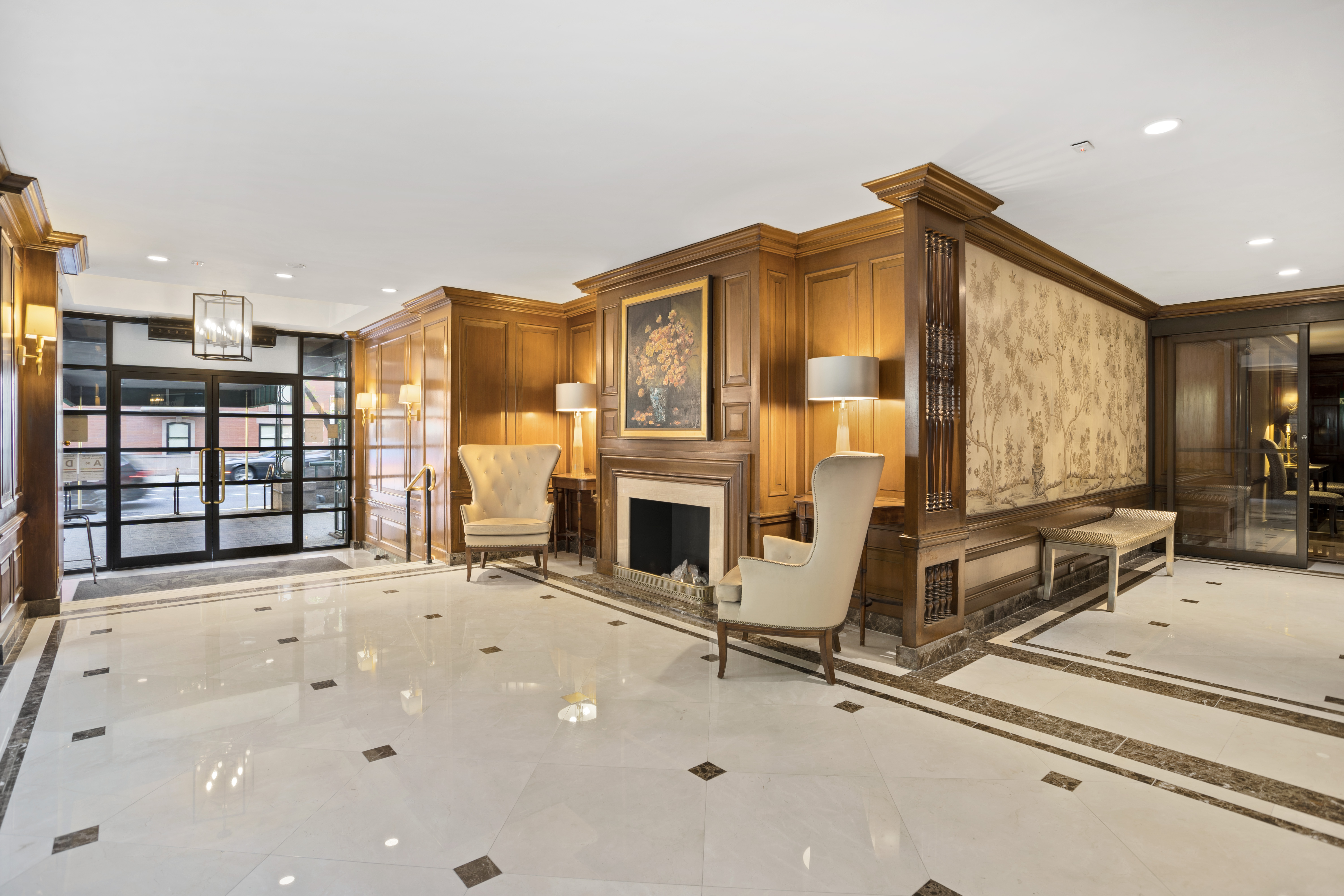 137 East 36th Street, Unit 21F Manhattan, NY 10016 - Photo 15 of 20 a view of a livingroom with furniture and a fireplace
