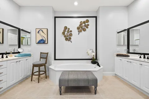 a bathroom with a bathtub and a sink