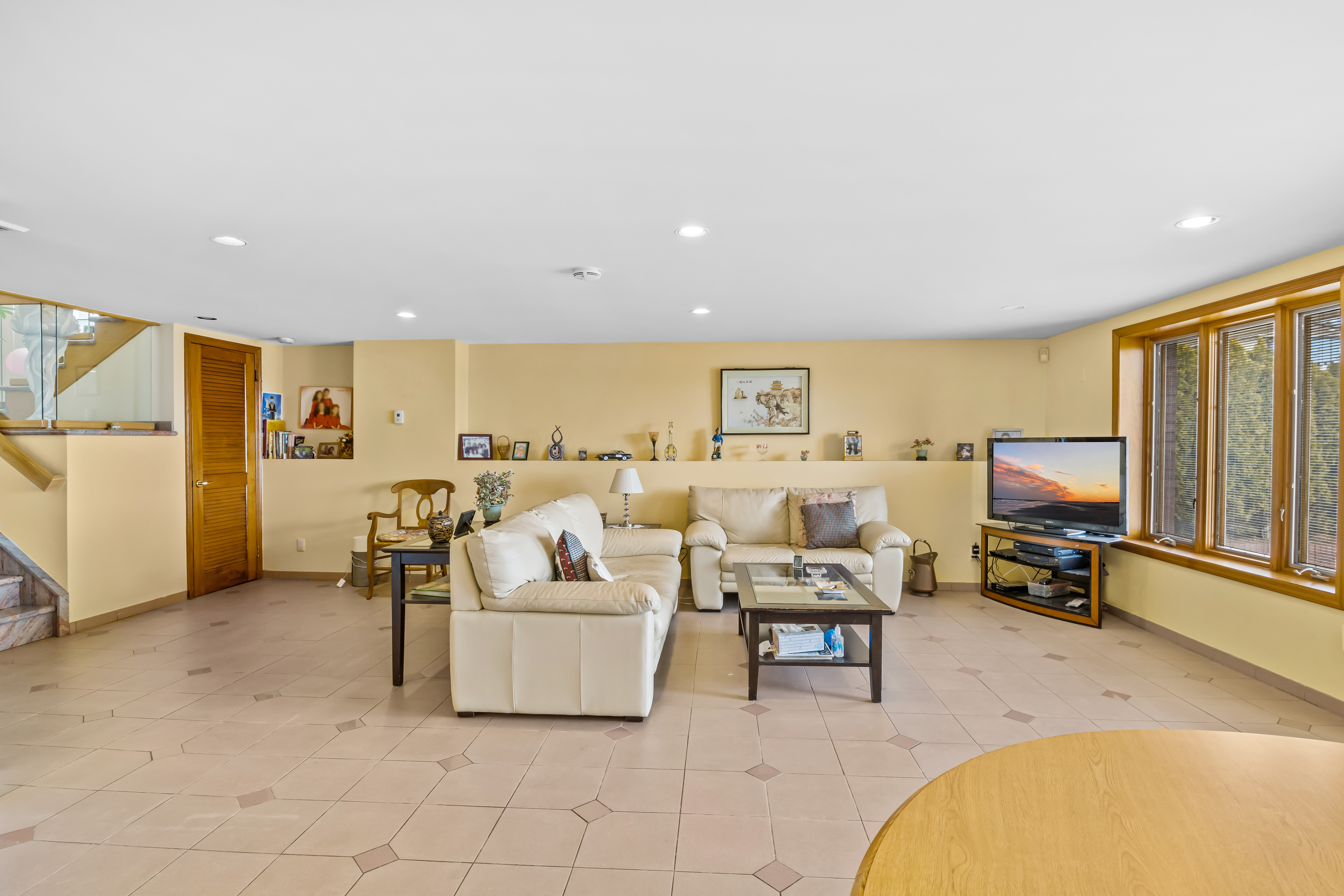 303 Whitman Drive Brooklyn, NY 11234 - Photo 27 of 37 a living room with furniture