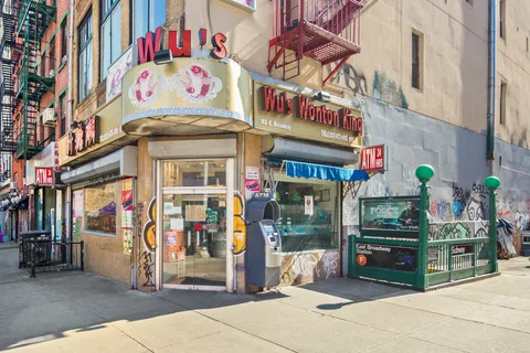 a view of street with sitting area