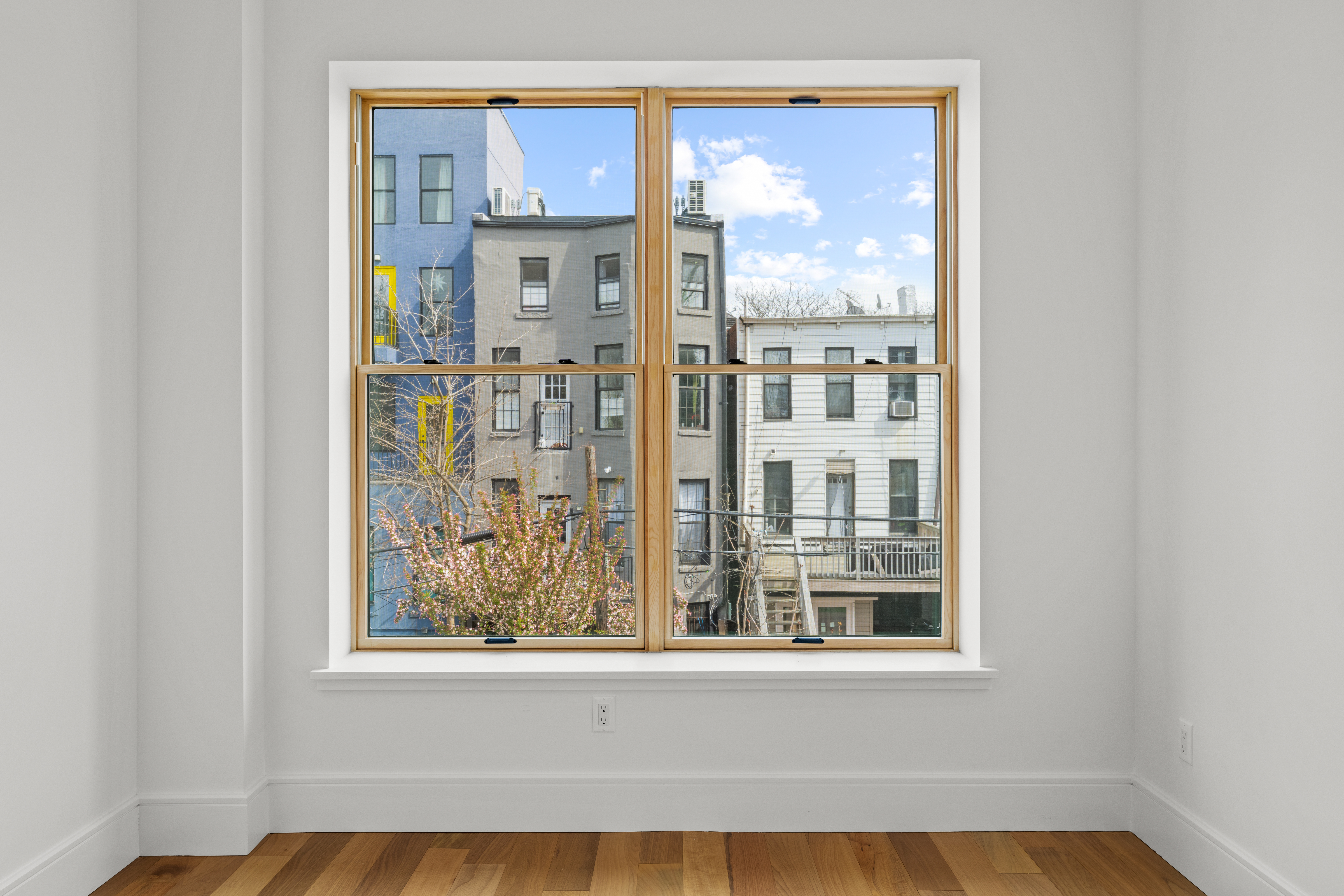 82 Cooper Street, Unit 2B Brooklyn, NY 11207 - Photo 11 of 17 a view of a room that has a window