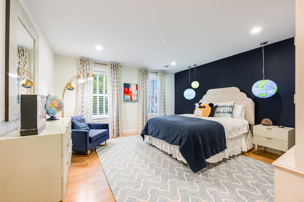 45 Washburn Avenue Needham, MA 02492 - Photo 14 of 23 a bedroom with a bed and a table