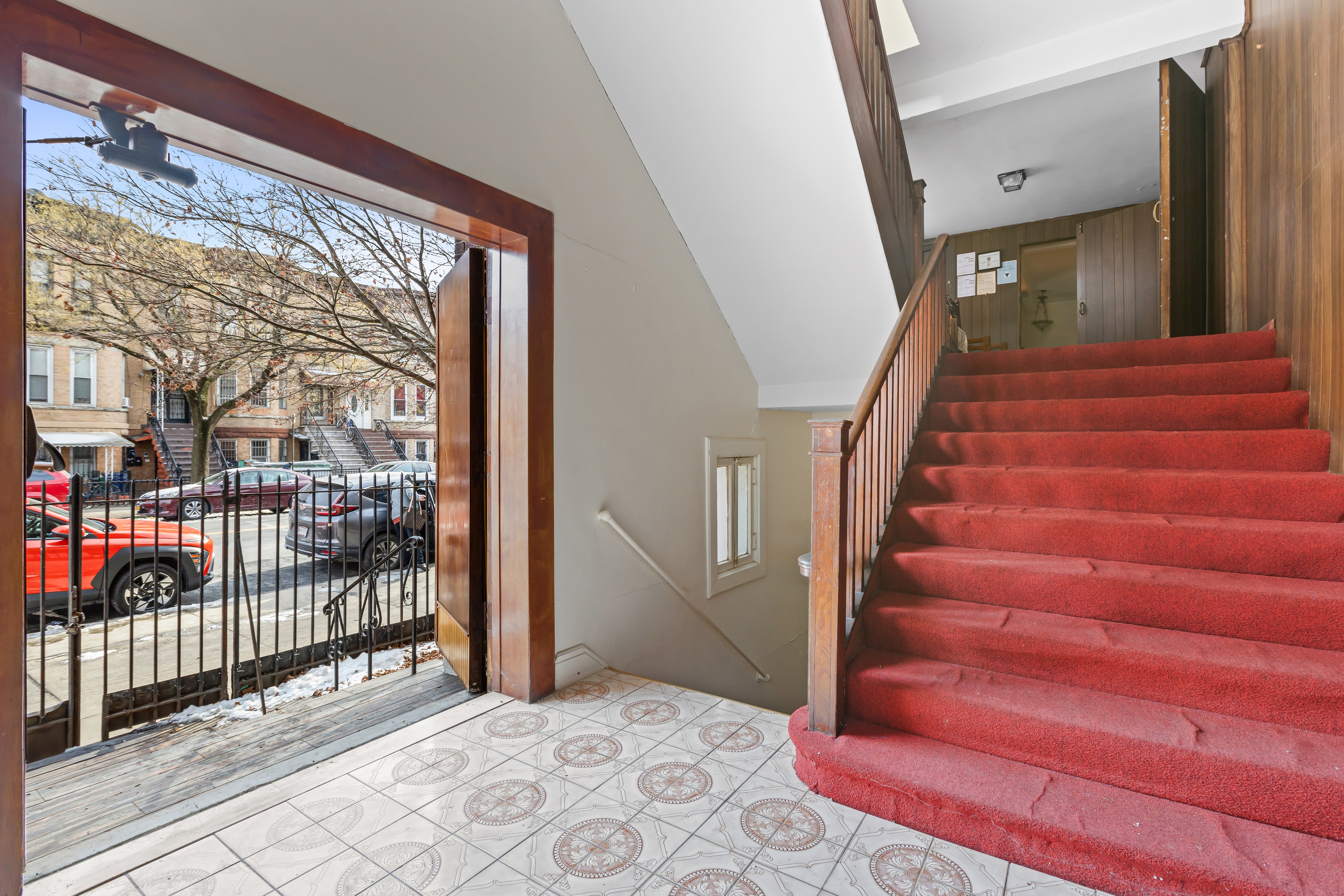 4802 6th Avenue Brooklyn, NY 11220 - Photo 6 of 21 a view of an entryway with staircase