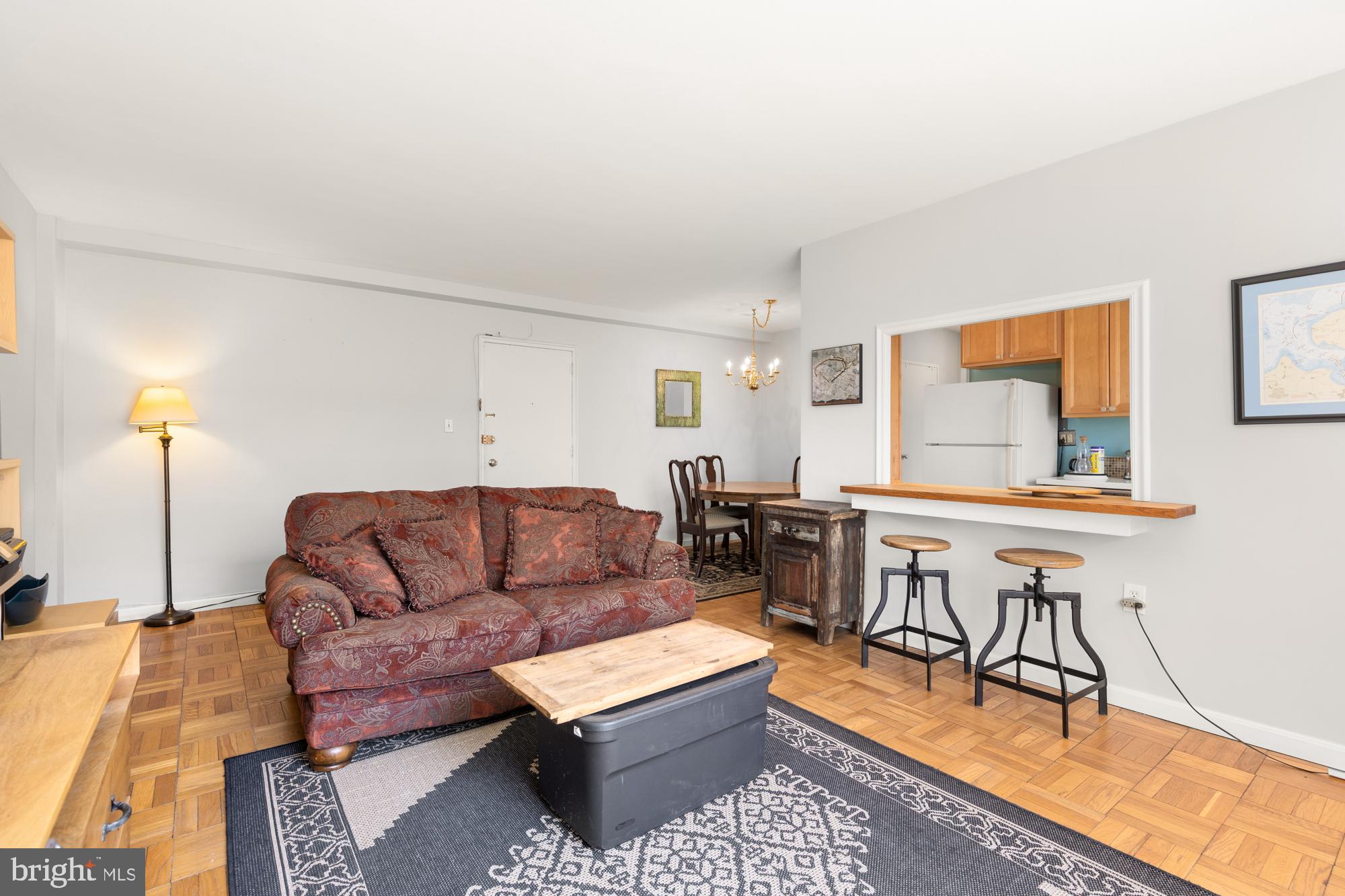 4100 W Street Northwest, Unit 314 Washington, DC 20007 - Photo 9 of 28 a living room with furniture and a window