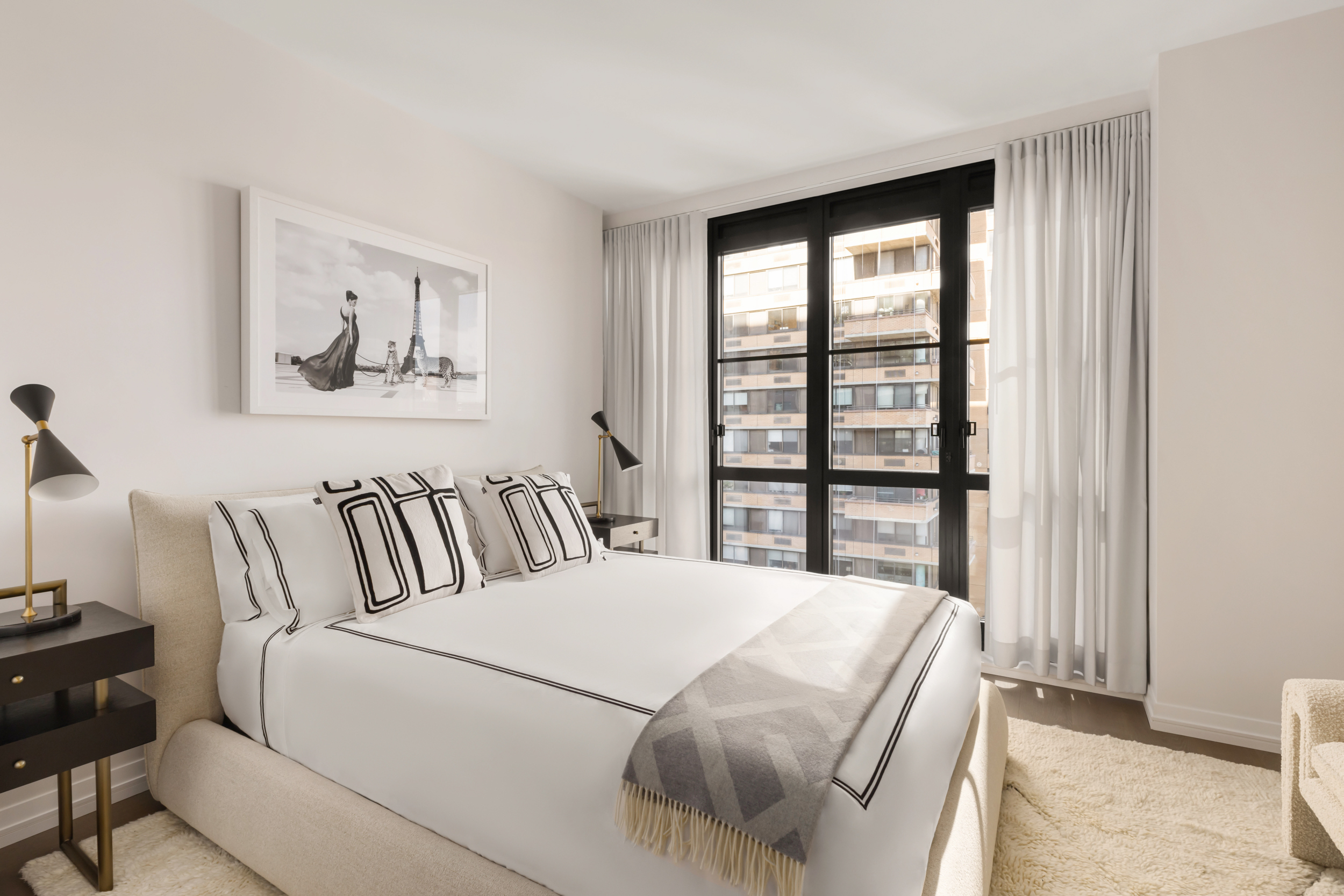 250 West 96th Street, Unit 5D Manhattan, NY 10025 - Photo 10 of 28 a bedroom with a large bed and a window