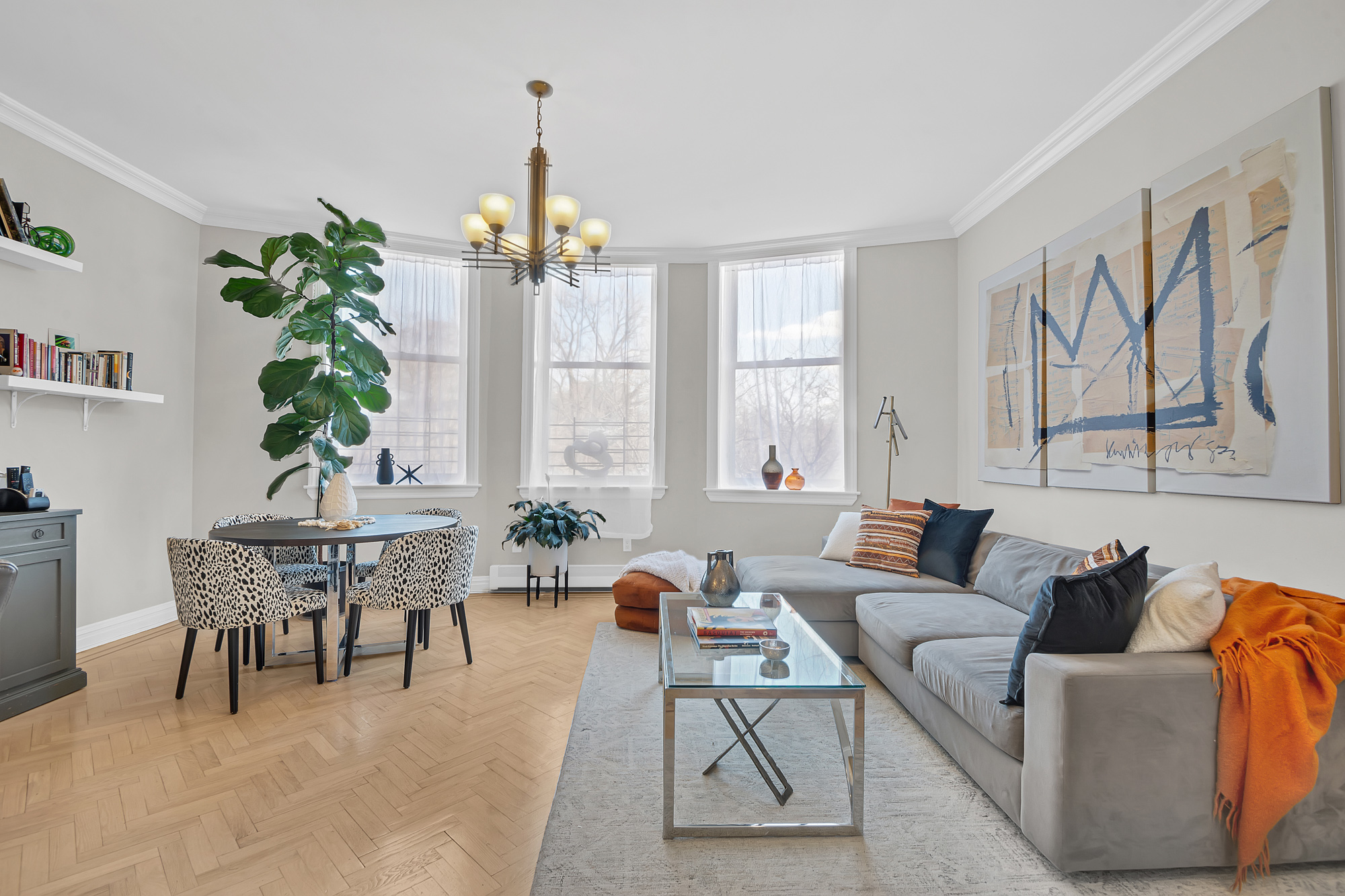 8 Mt Morris Park West, Unit C Manhattan, NY 10027 - Photo 2 of 12 a living room with furniture potted plant and a window