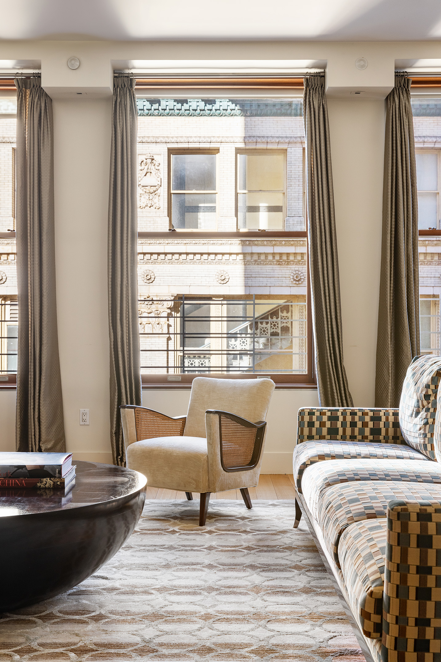 32 West 18th Street, Unit 7B Manhattan, NY 10011 - Photo 4 of 19 a living room with furniture and a window