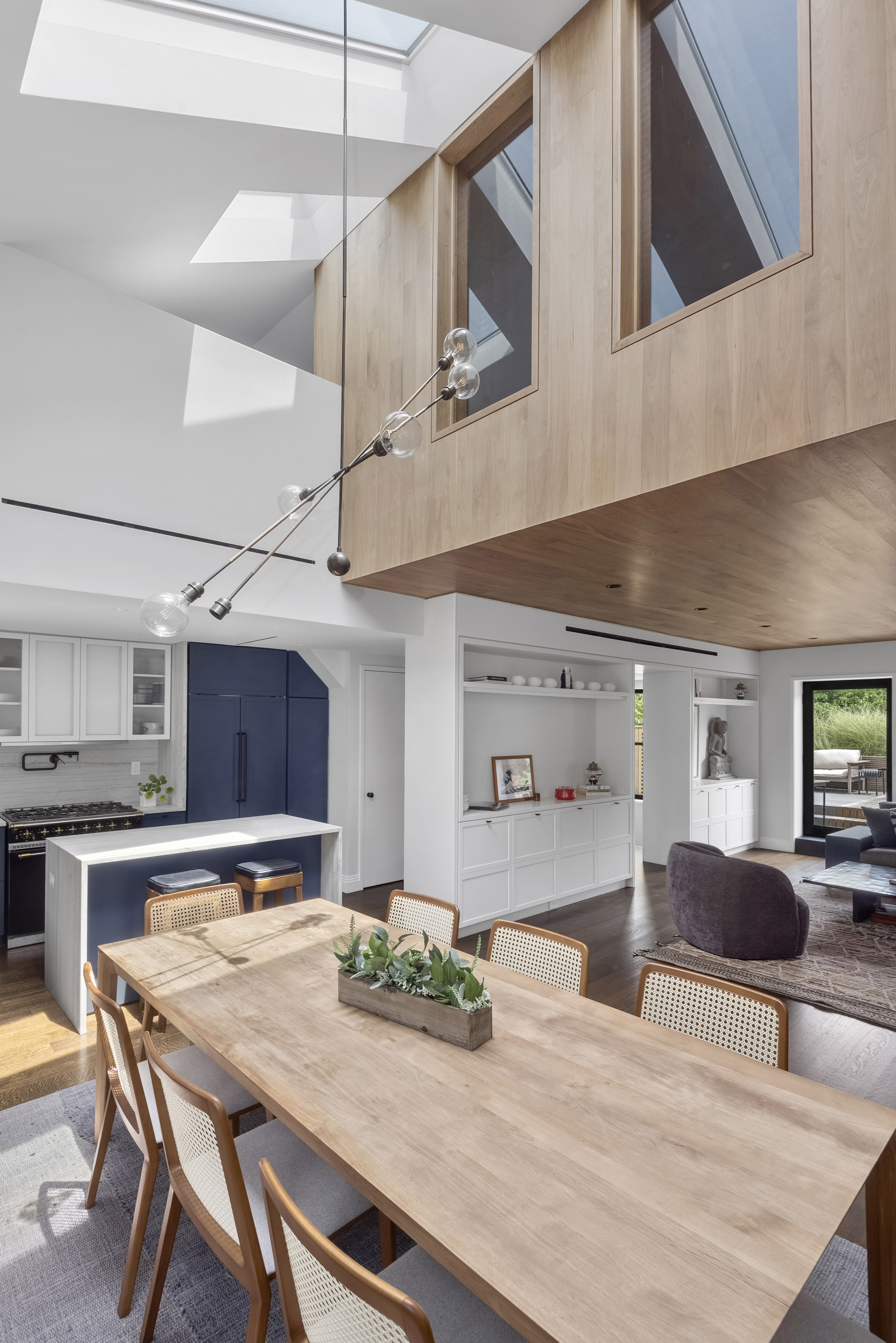 9 Garden Place, Unit 2 Brooklyn, NY 11201 - Photo 5 of 18 a kitchen with stainless steel appliances kitchen island a table and chairs in it