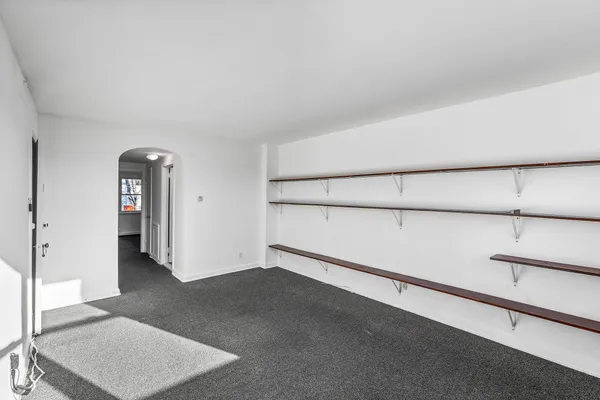 a view of a room with an empty space