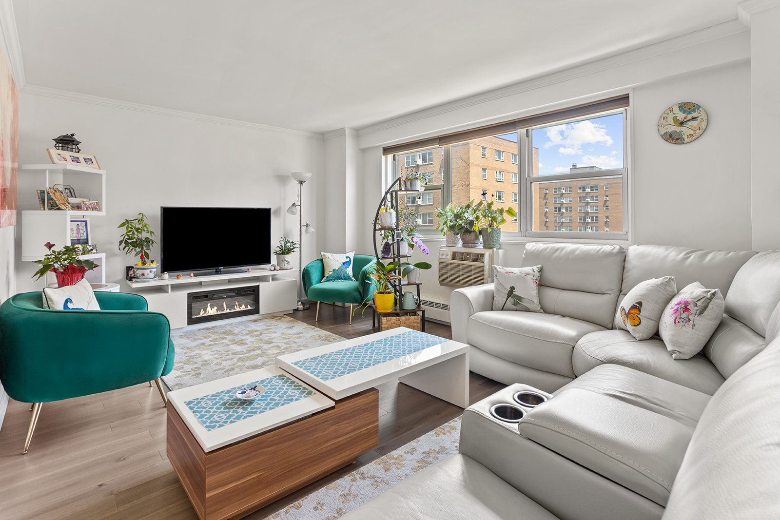 122 Ashland Place, Unit 12D Brooklyn, NY 11201 - Photo 1 of 16 a living room with furniture a flat screen tv and a large window