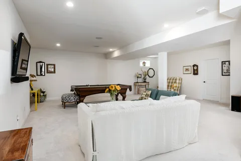 a bedroom with bed and window