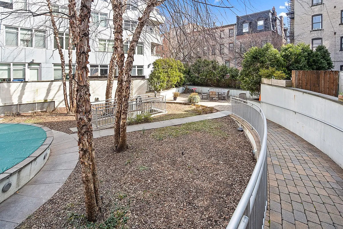 181 Clermont Avenue, Unit 101 Brooklyn, NY 11205 - Photo 5 of 9 a view of a backyard with sitting area