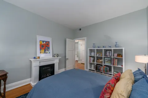 a view of a livingroom with furniture and workspace