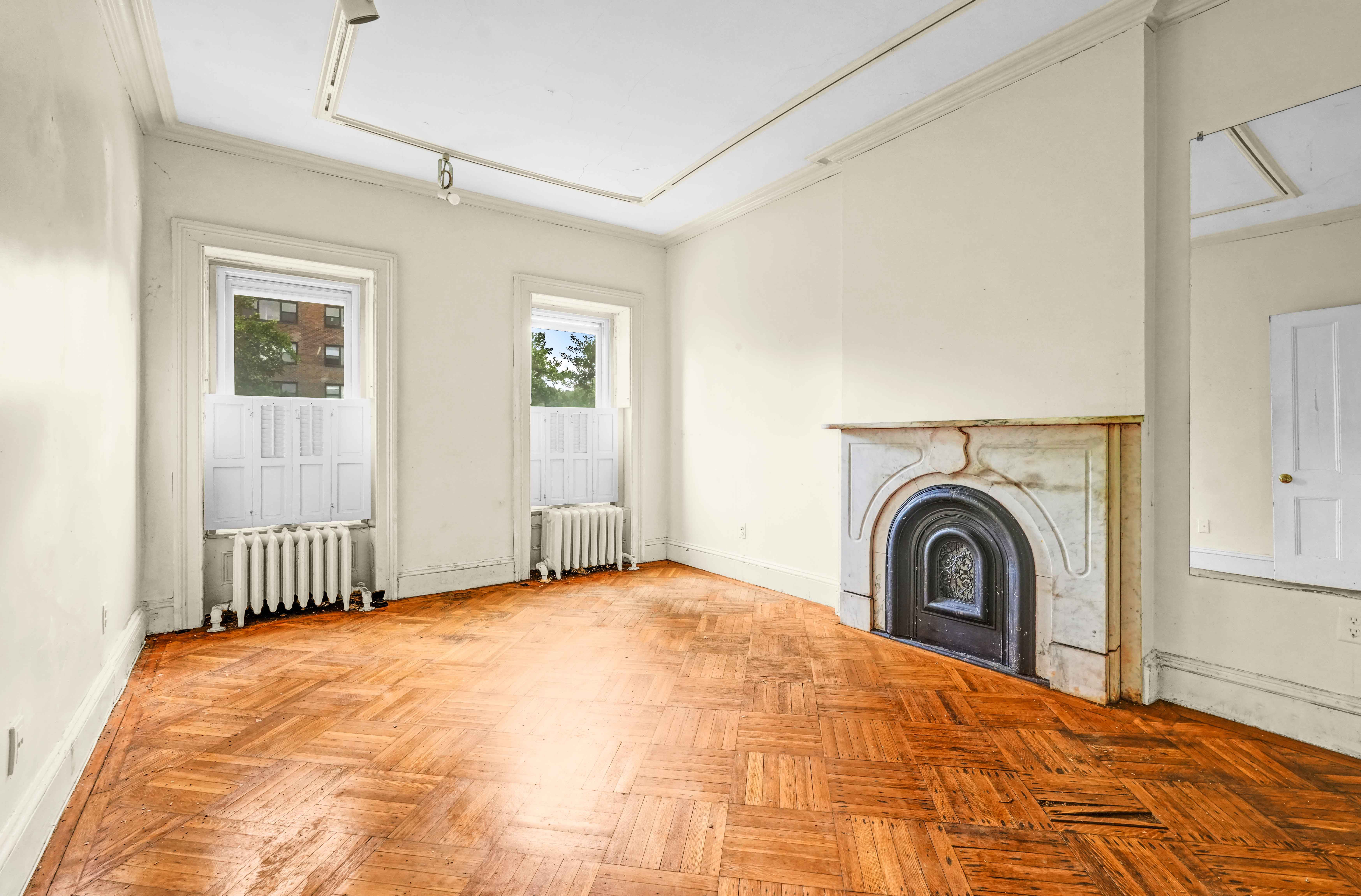 300 Lafayette Avenue Brooklyn, NY 11238 - Photo 12 of 17 a view of a bedroom with washing machine