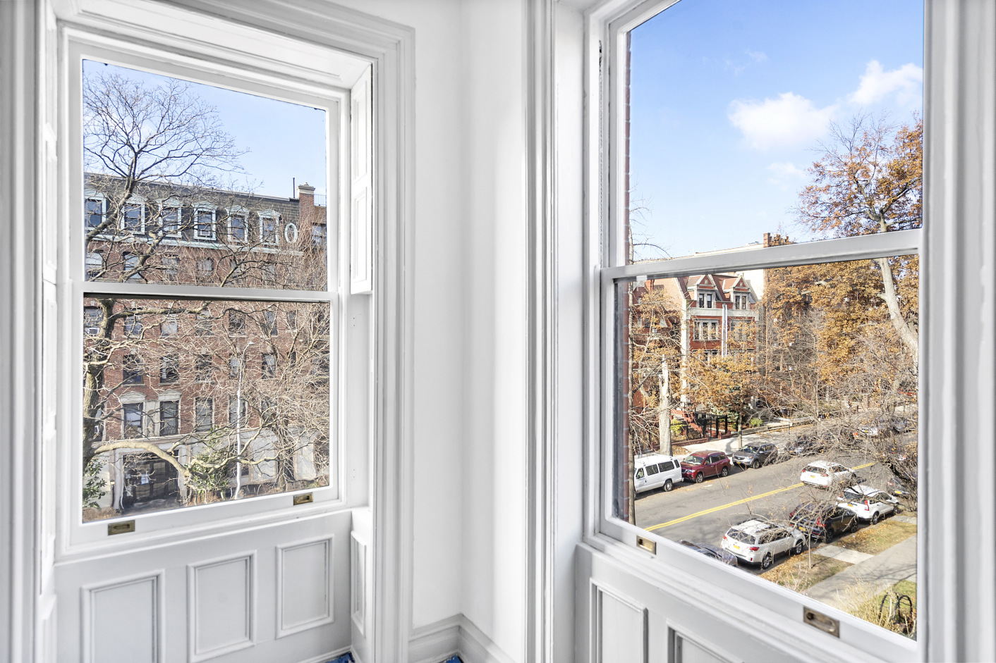 419 Clinton Avenue, Unit 2 Brooklyn, NY 11238 - Photo 1 of 11 a view of a glass door with a tree