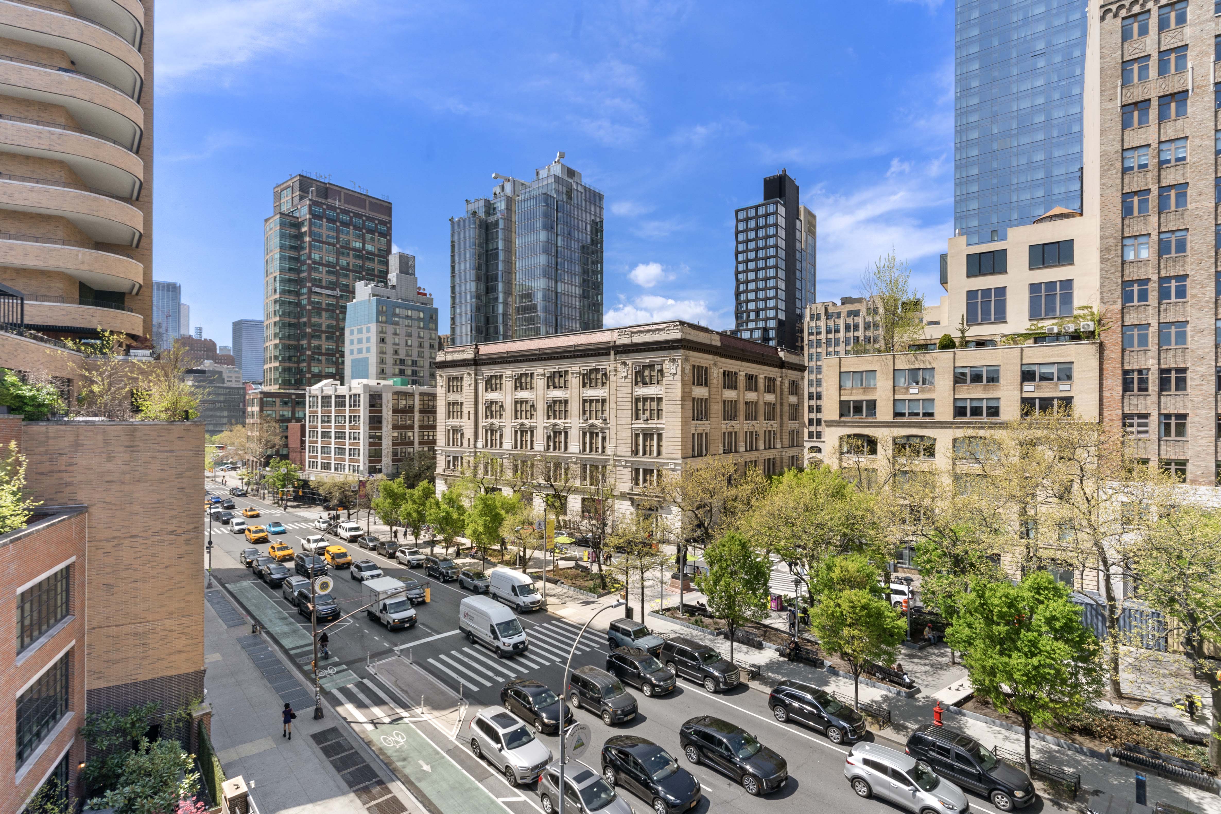 210 Spring Street, Unit 5 Manhattan, NY 10012 - Photo 8 of 10 a city view with tall buildings