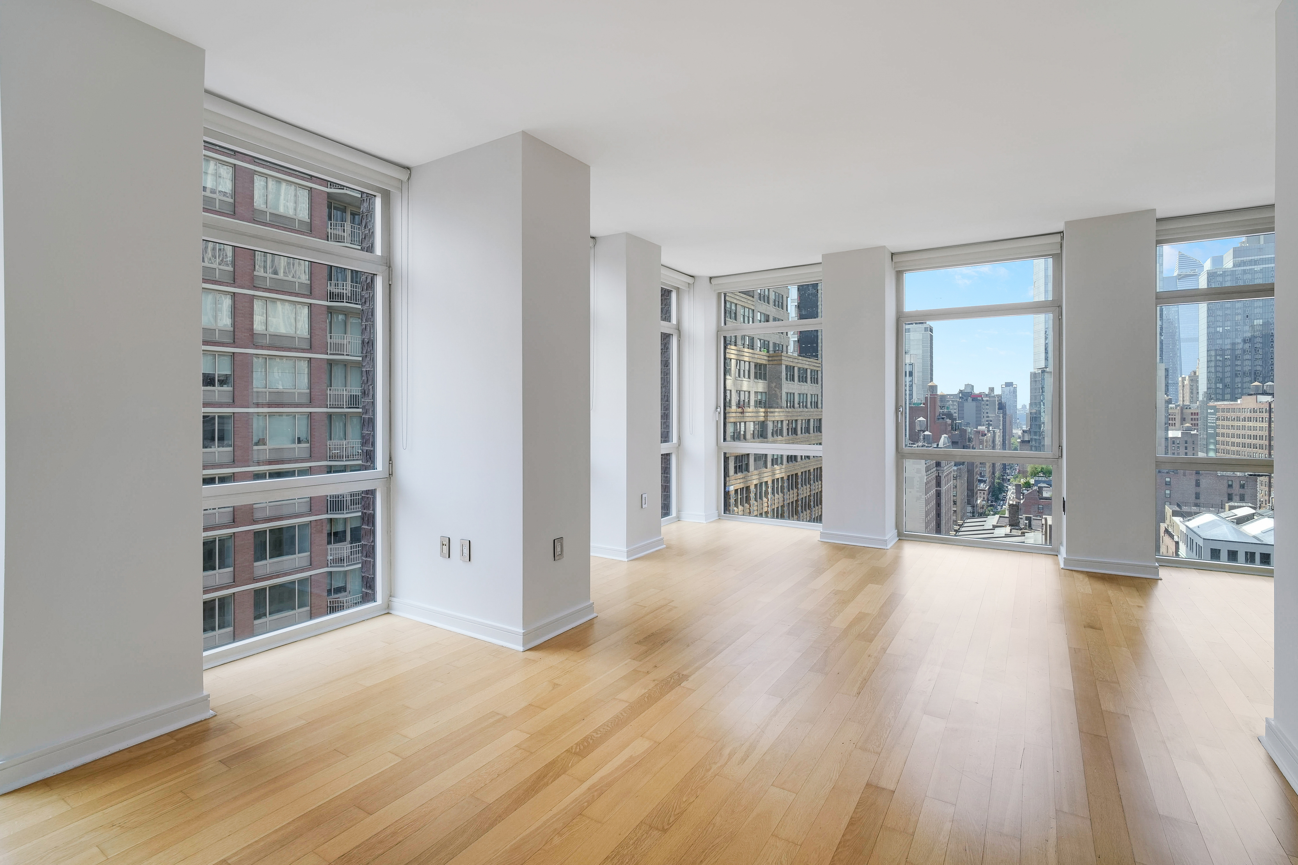 11 East 29th Street, Unit 21A Manhattan, NY 10016 - Photo 1 of 25 wooden floor in an empty room with a window