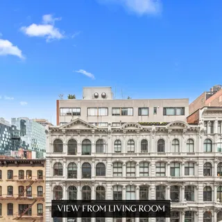 a front view of a building with glass windows