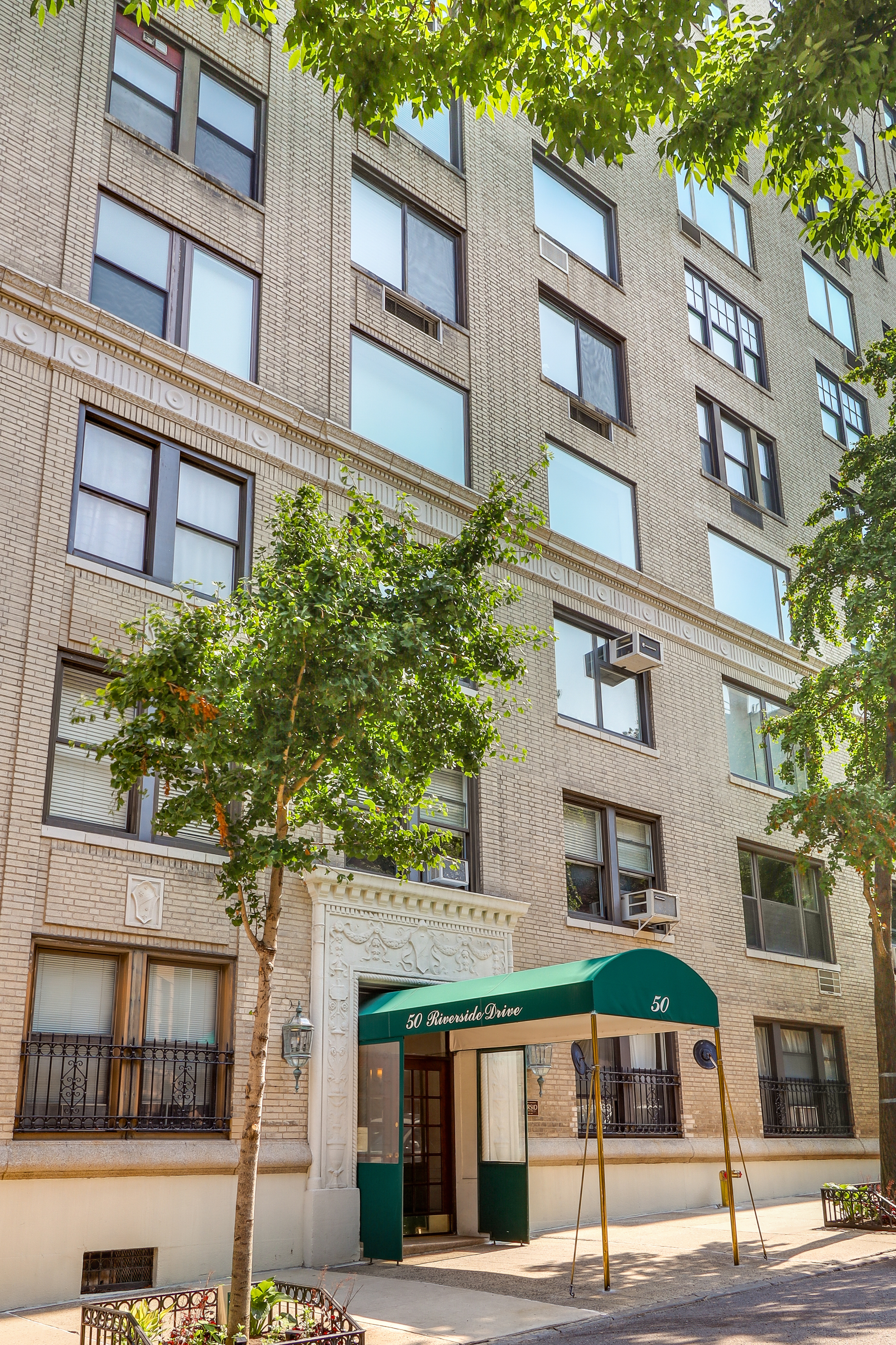 50 Riverside Drive, Unit 5E Manhattan, NY 10024 - Photo 16 of 22 a front view of a multi story building
