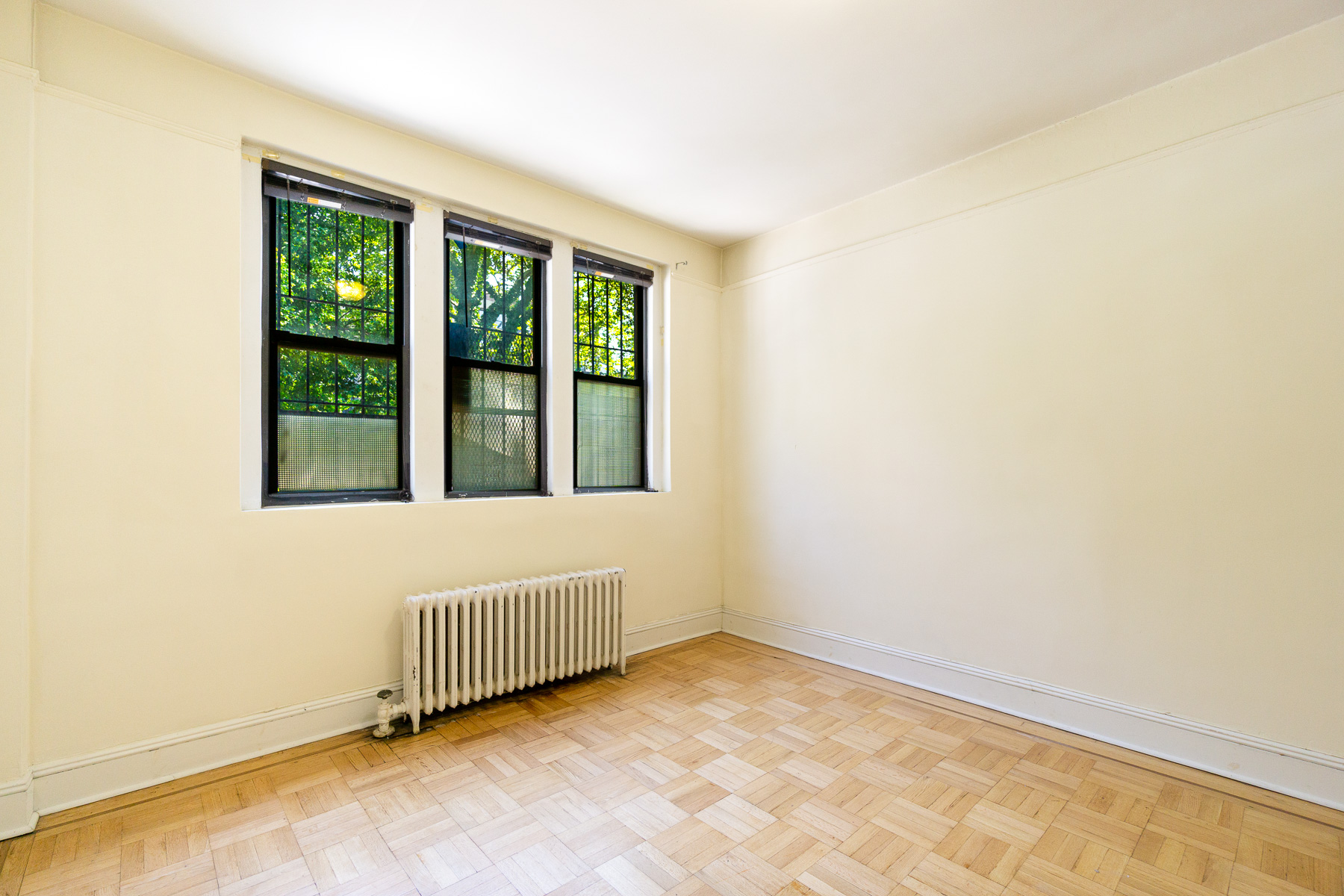 55 East 2nd Street, Unit 1 Manhattan, NY 10003 - Photo 3 of 18 a view of an empty room with a window