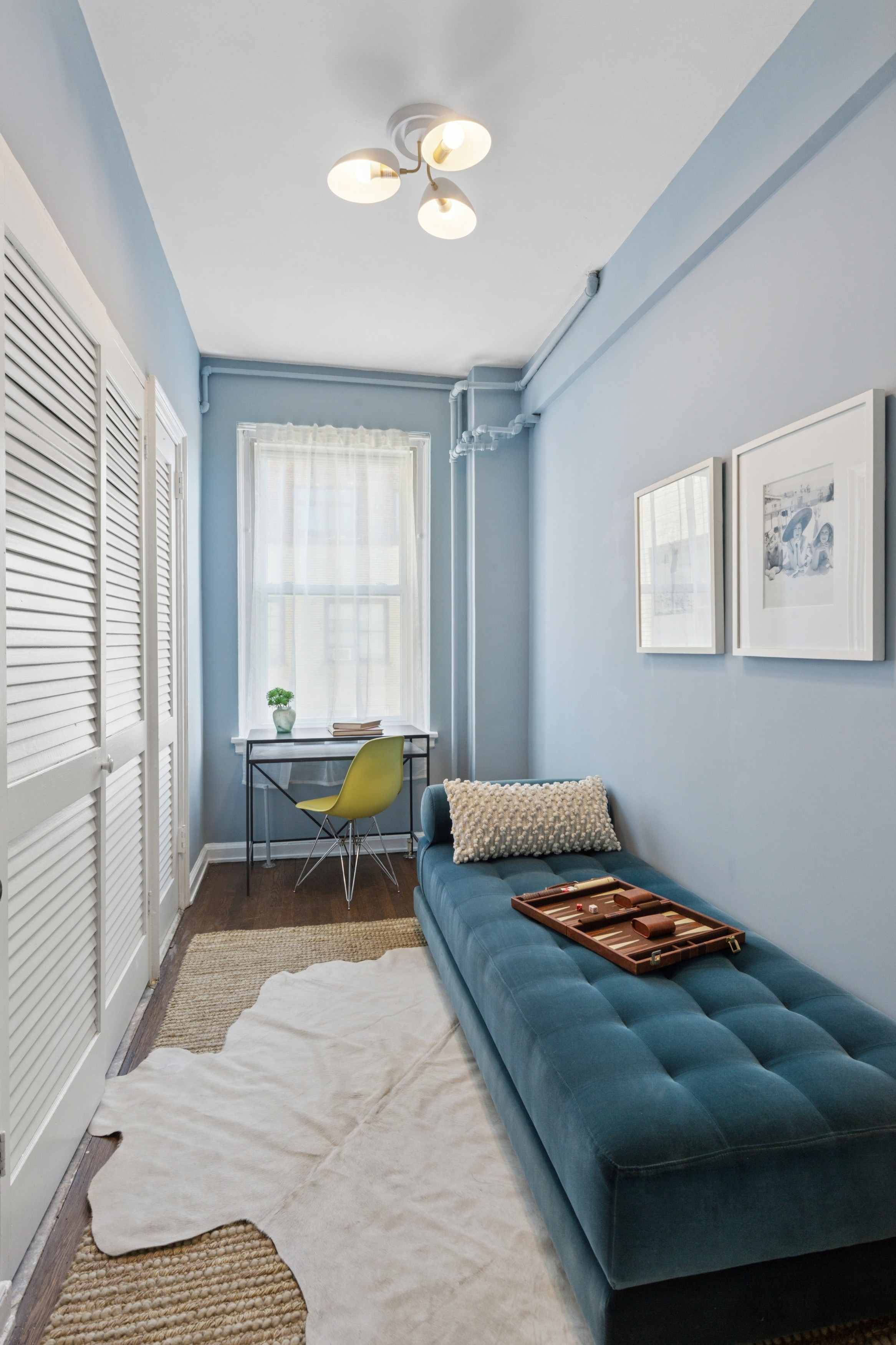 336 Central Park West, Unit 16F Manhattan, NY 10025 - Photo 16 of 18 a bedroom with a bed and a window