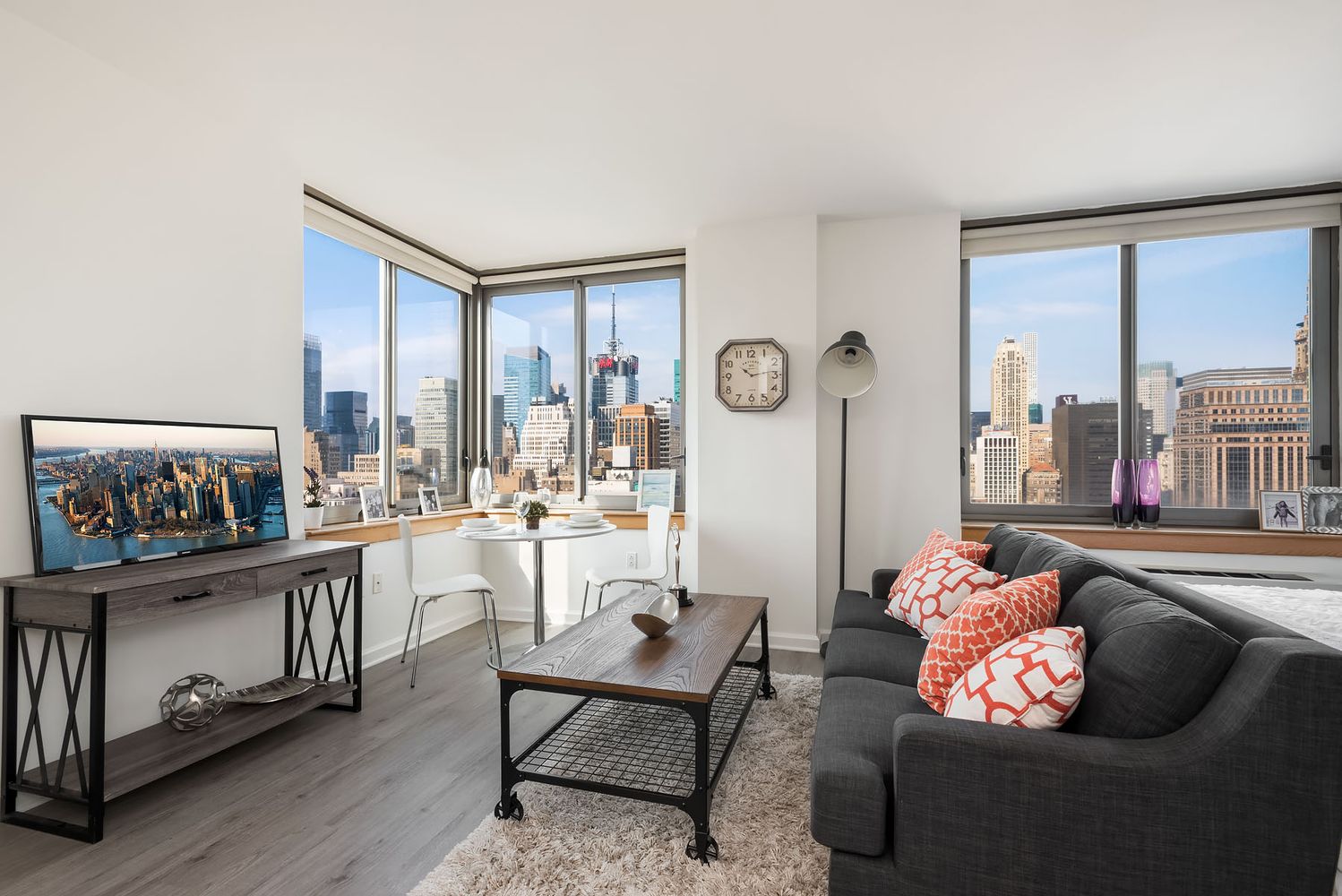 35 West 33rd Street, Unit 26A Manhattan, NY 10001 - Photo 2 of 28 a living room with furniture and a large window