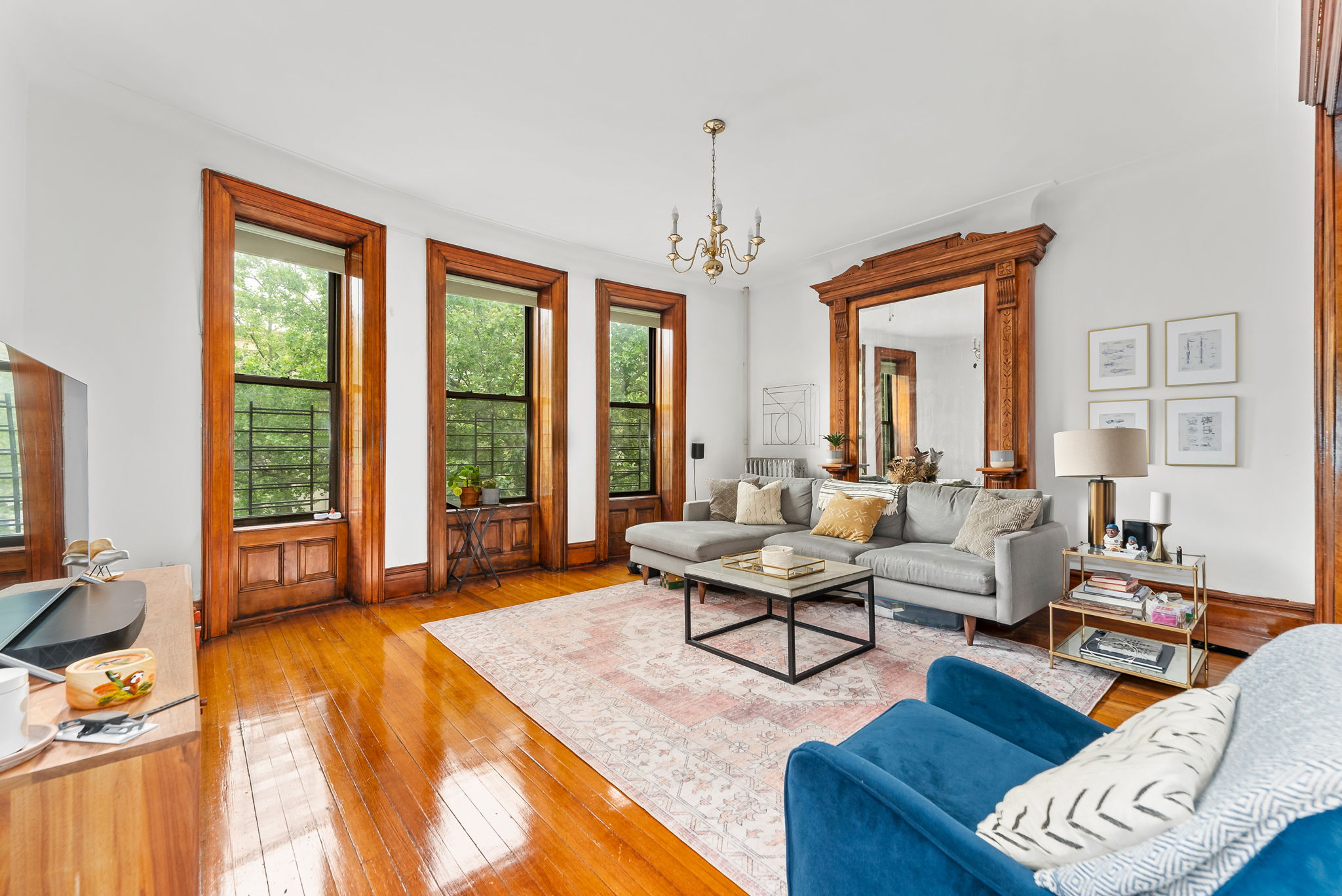 461 3rd Street, Unit 3L Brooklyn, NY 11215 - Photo 1 of 10 a living room with furniture and a large window