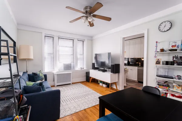 a living room with furniture and a window